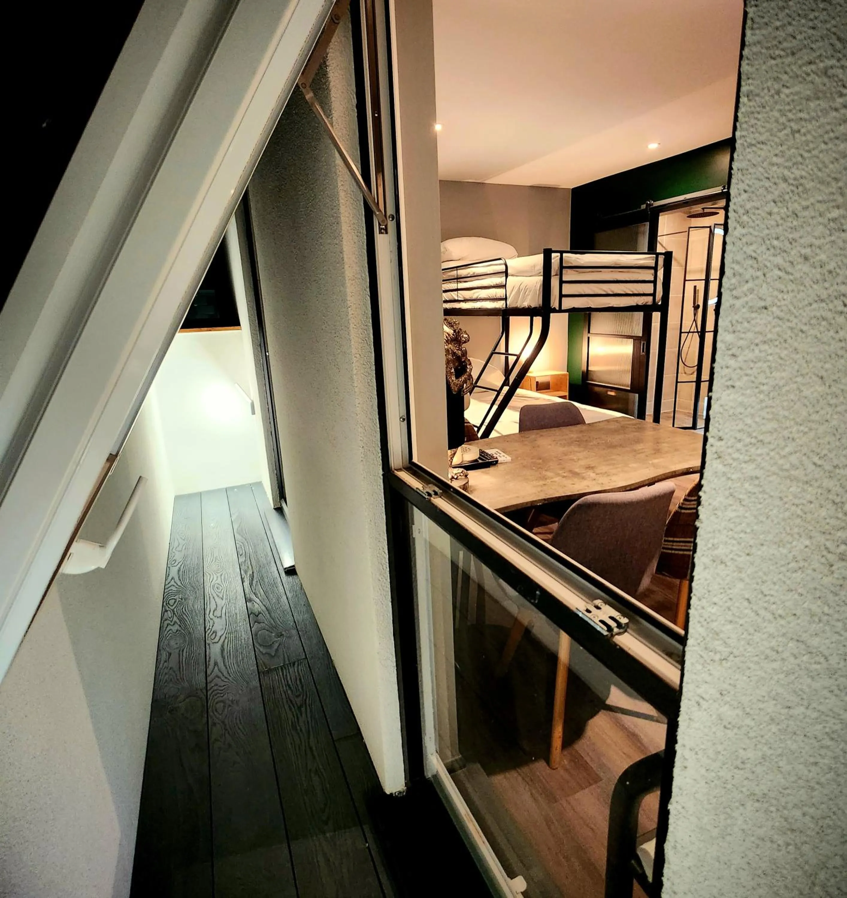 Bed in Pinnacle Suites Hotel