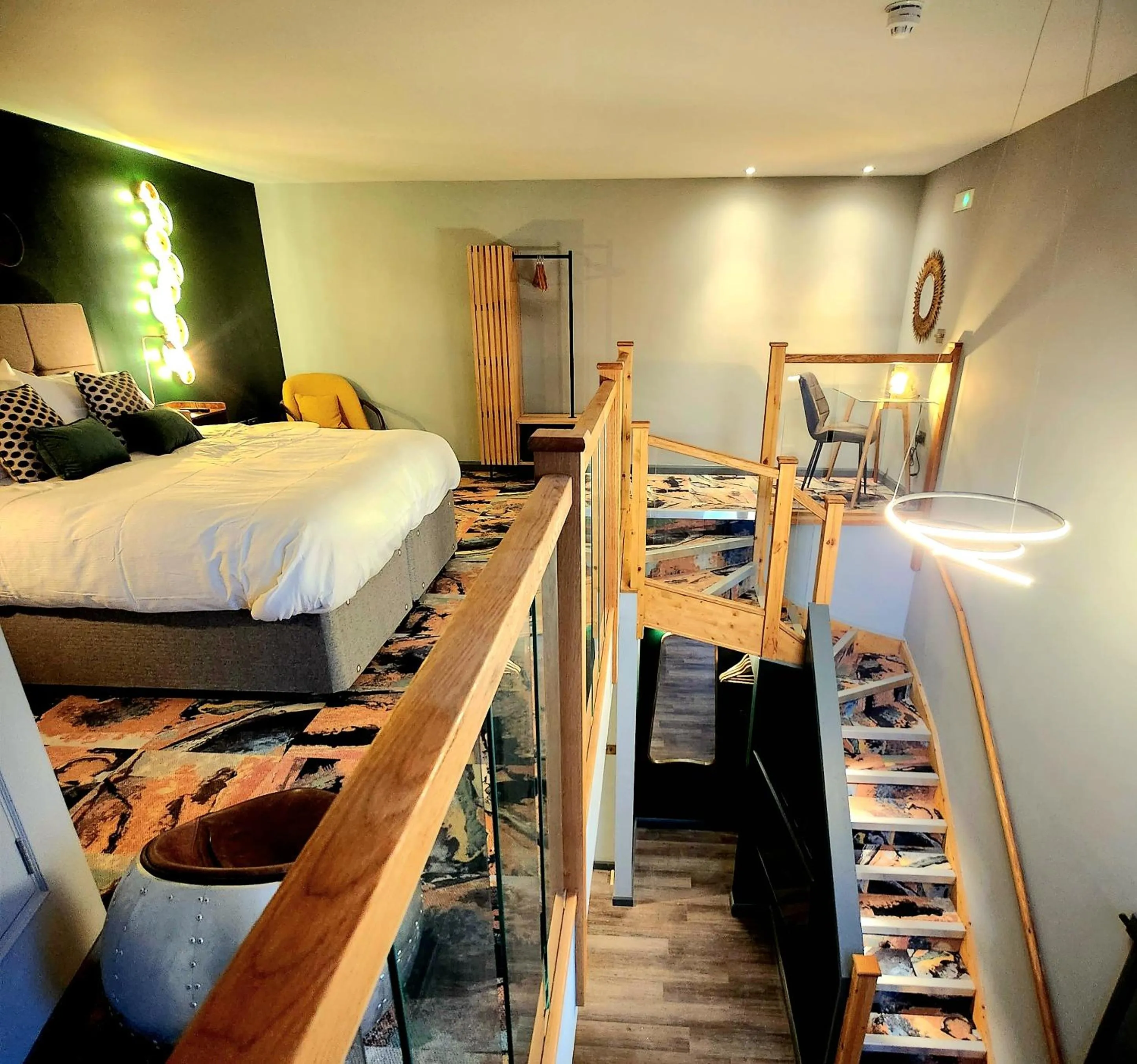 Bed in Pinnacle Suites Hotel