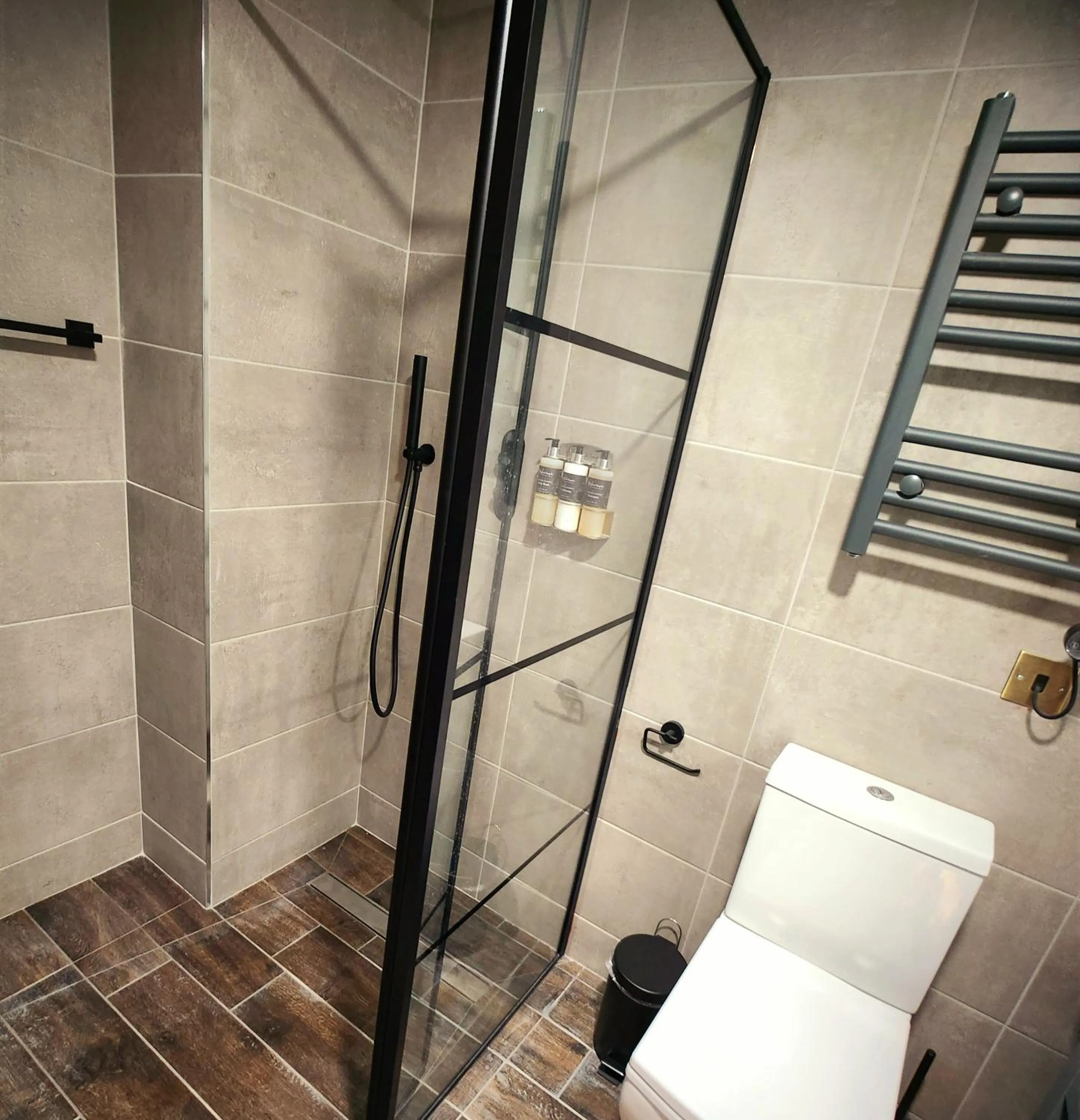 Shower in Pinnacle Suites Hotel