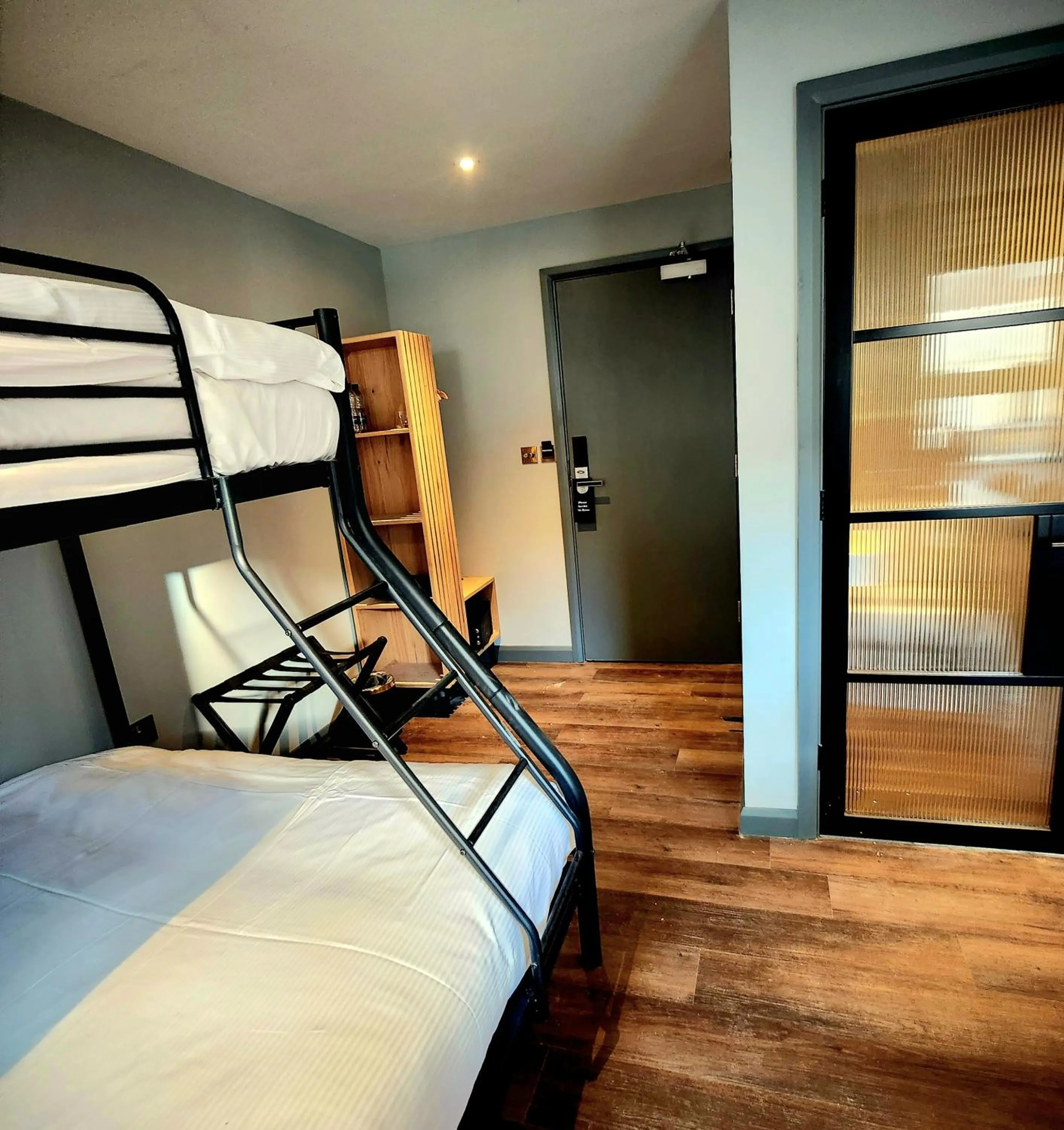 Bed in Pinnacle Suites Hotel