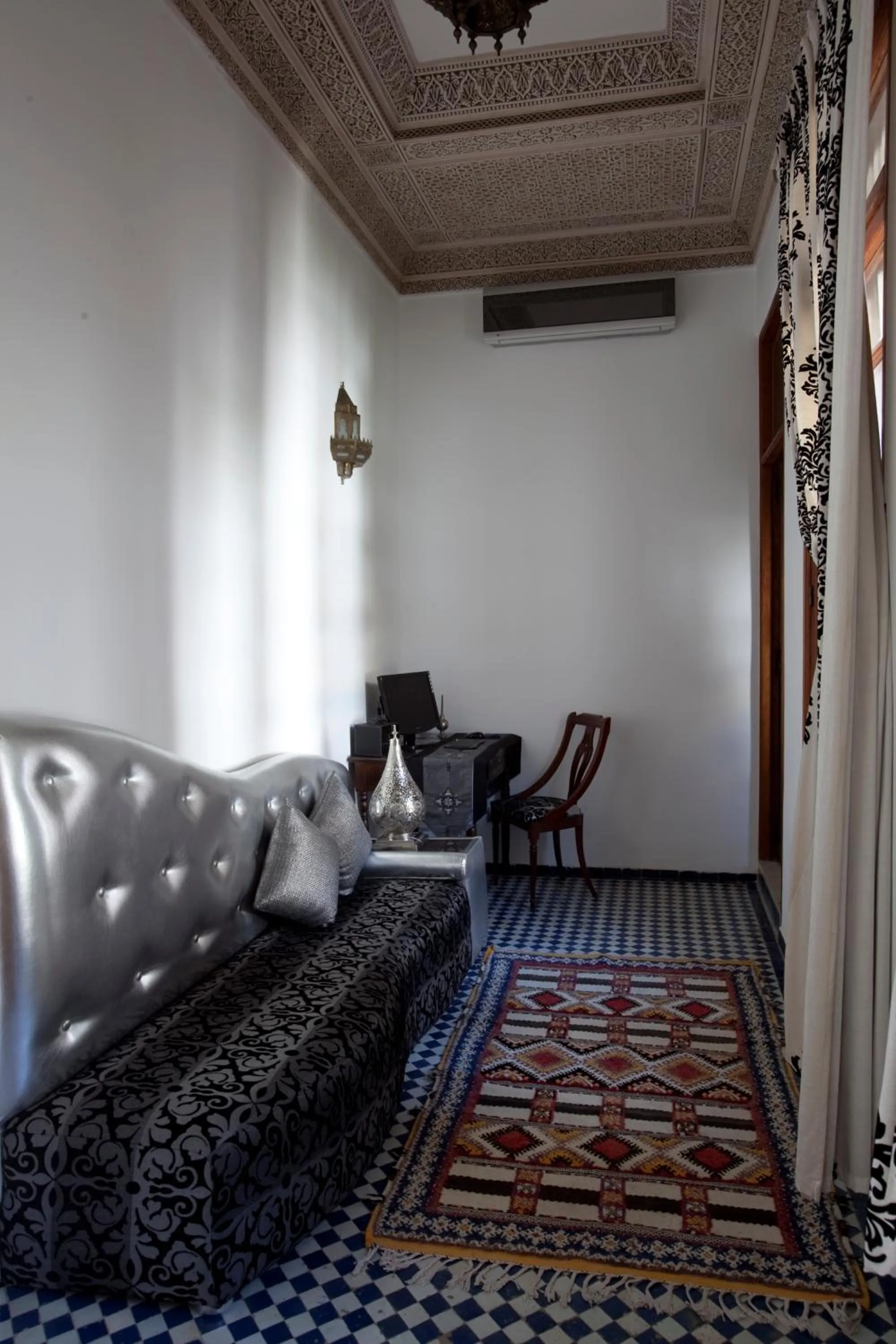 Seating area, Bed in Riad Alya