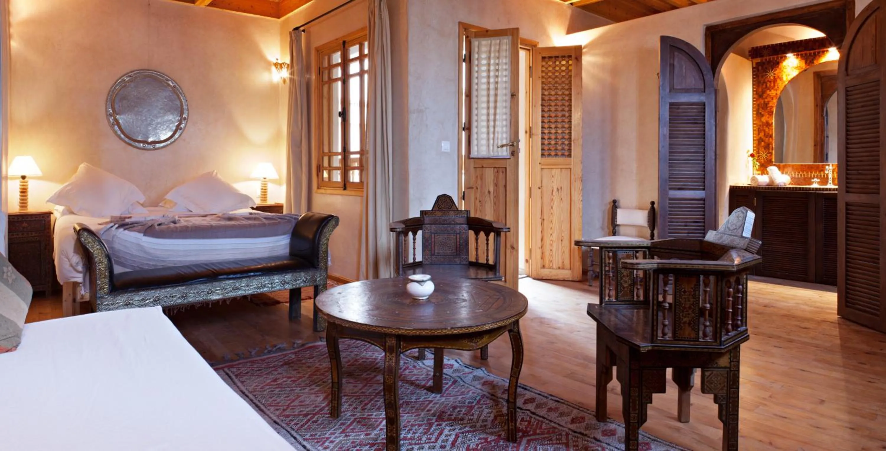 Seating area, Bed in Riad Chbanate