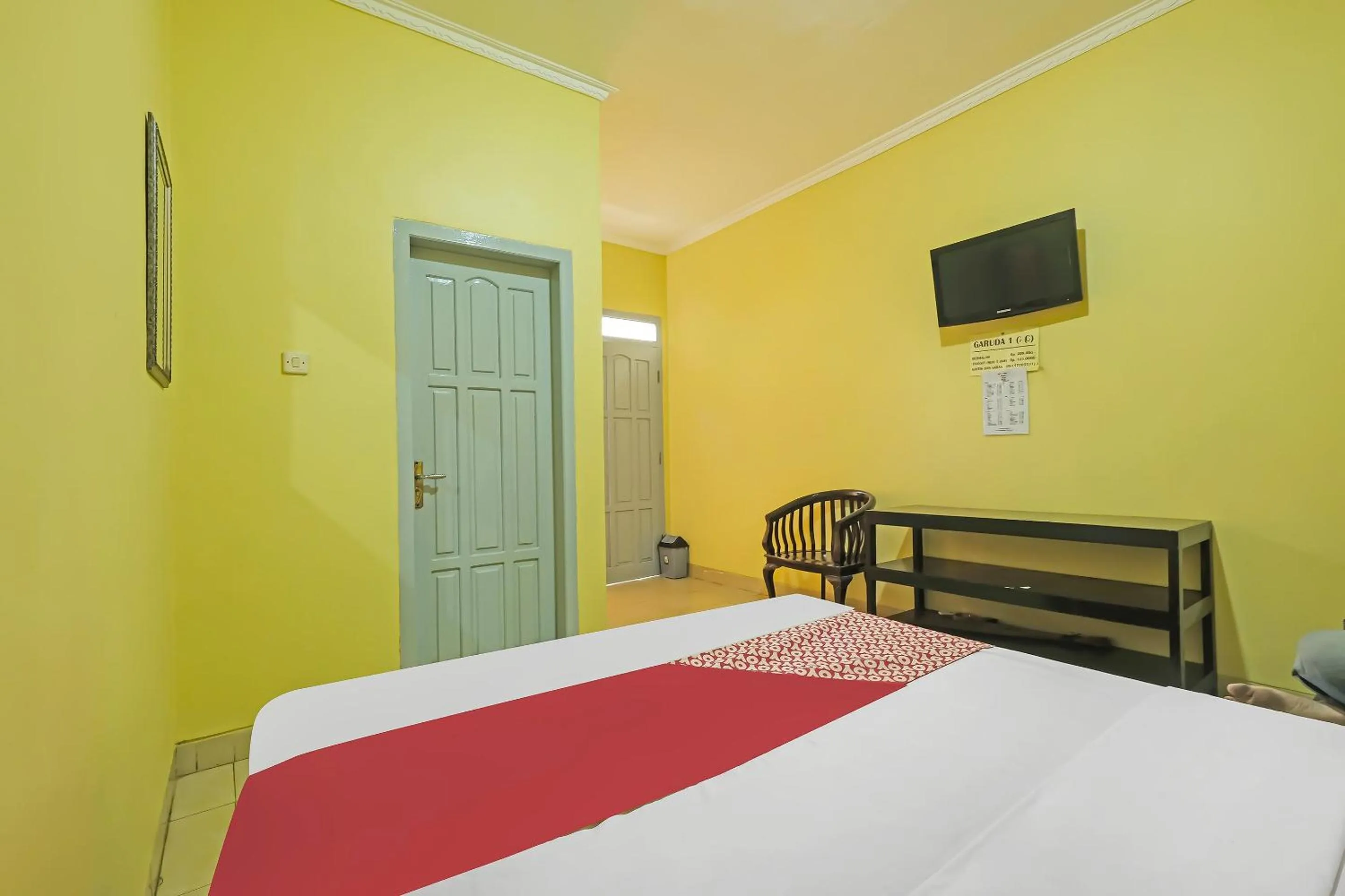 Bedroom in OYO 92485 Hotel Family