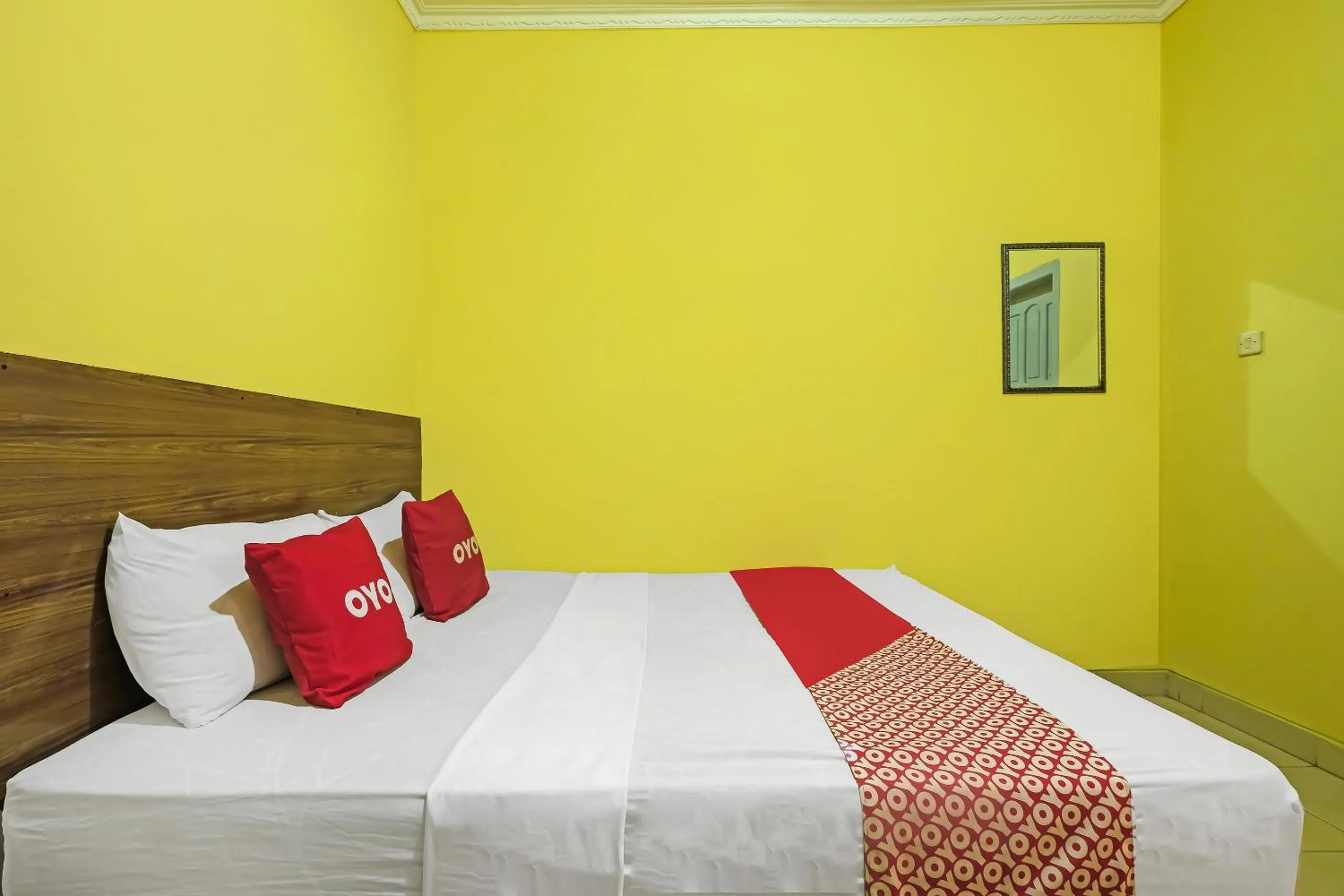 Bedroom in OYO 92485 Hotel Family