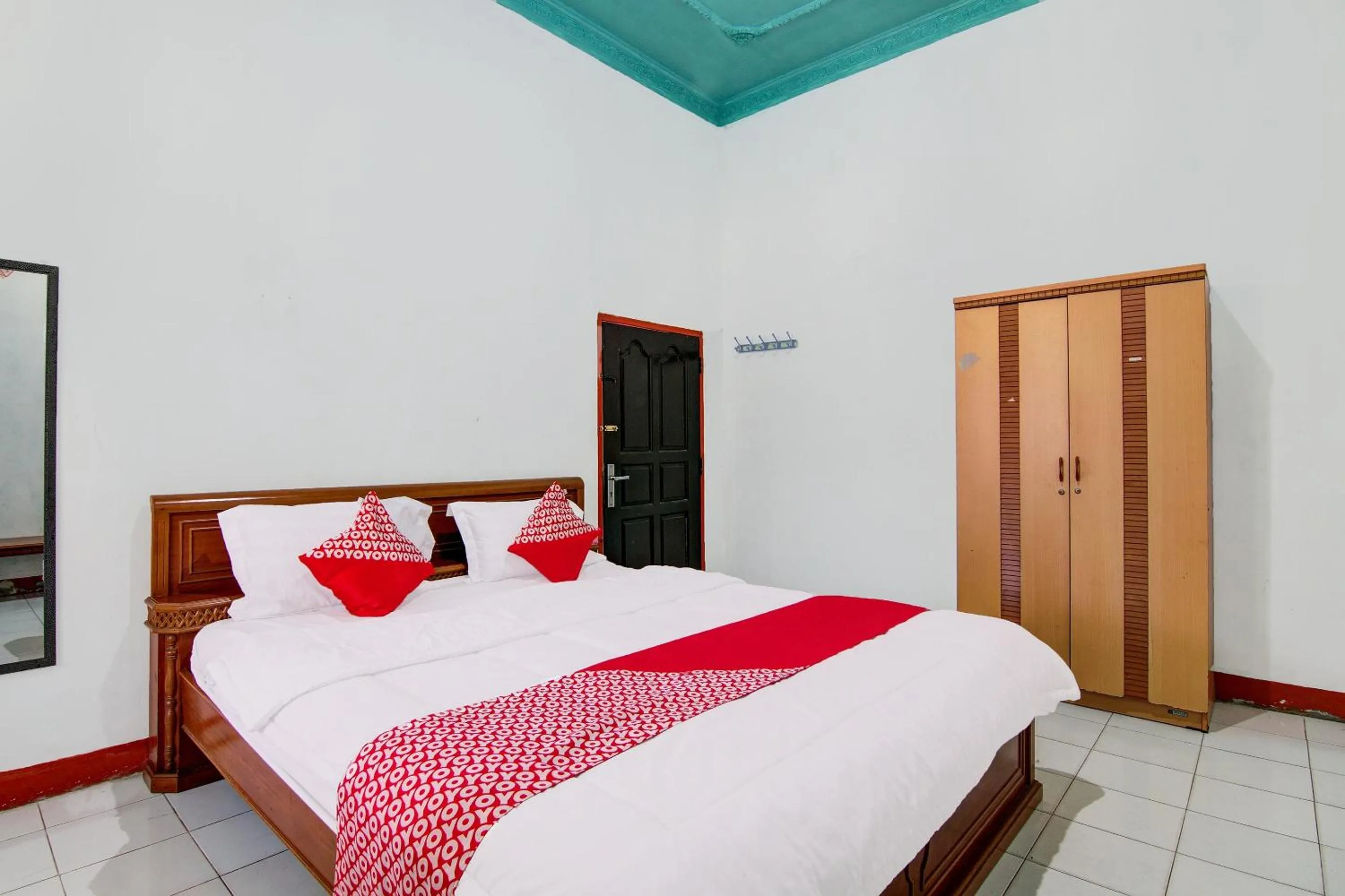 Bedroom, Bed in OYO 92497 Penginapan Pasir Indah SyariahNearMonument Park City Sand Pengaraian