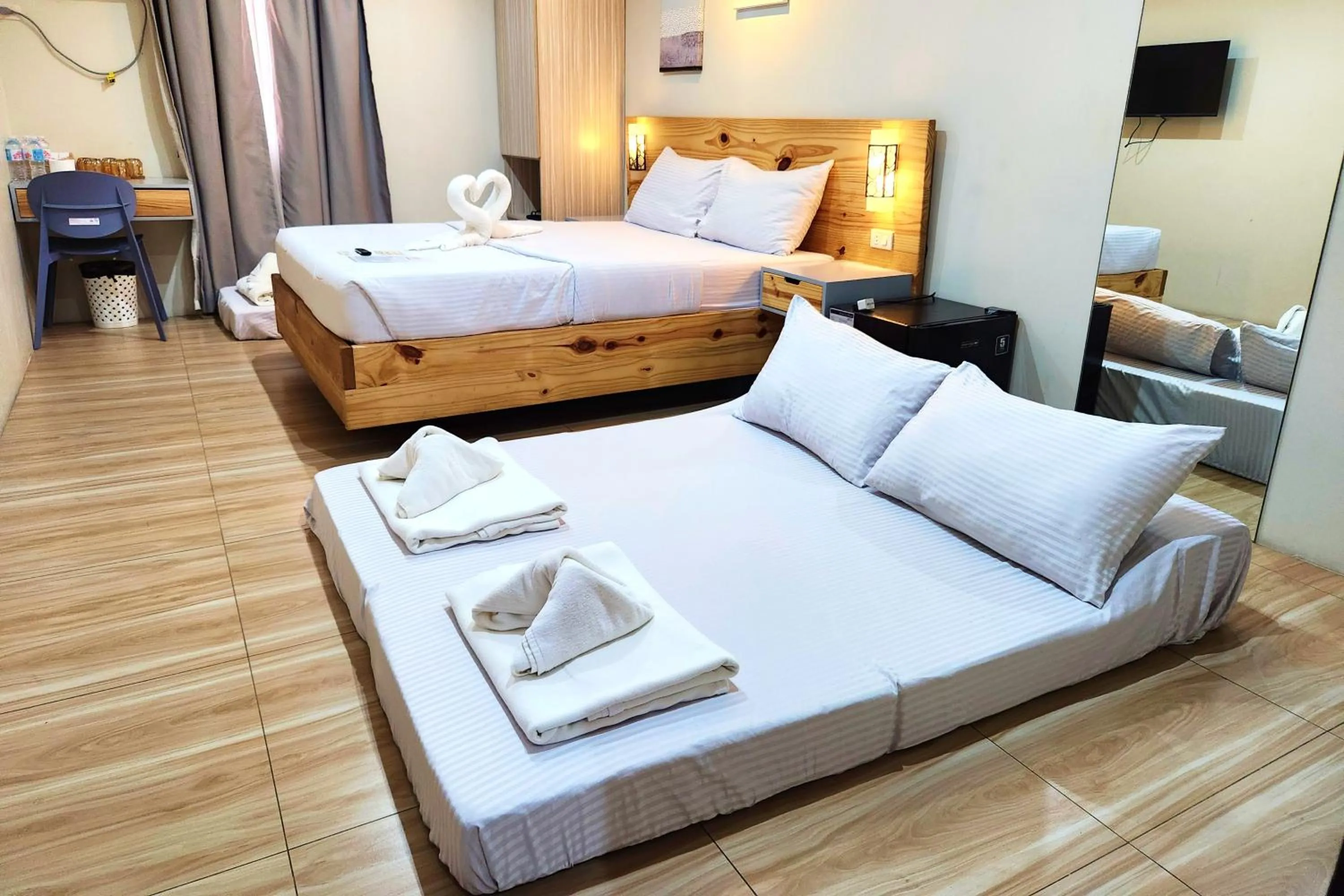 Bed in DLT Suites Cebu powered by Cocotel