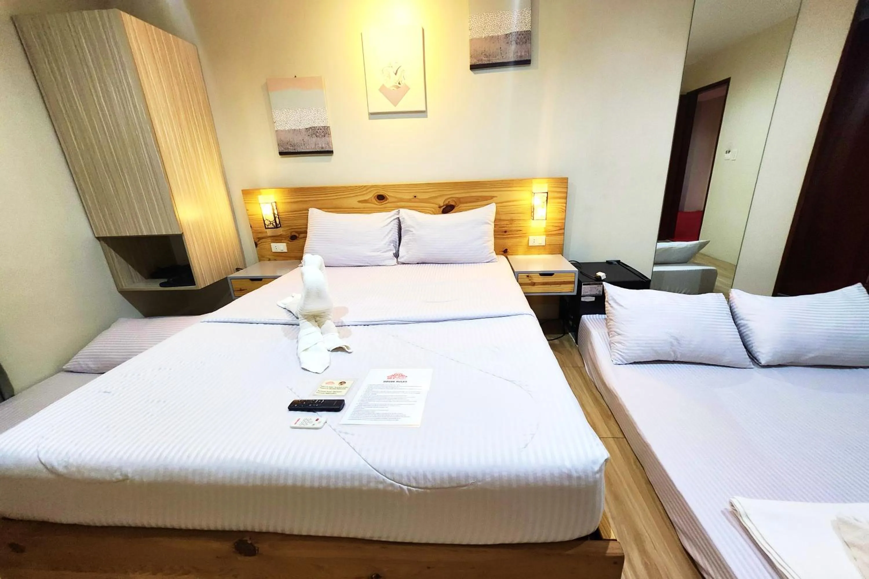 Bed in DLT Suites Cebu powered by Cocotel