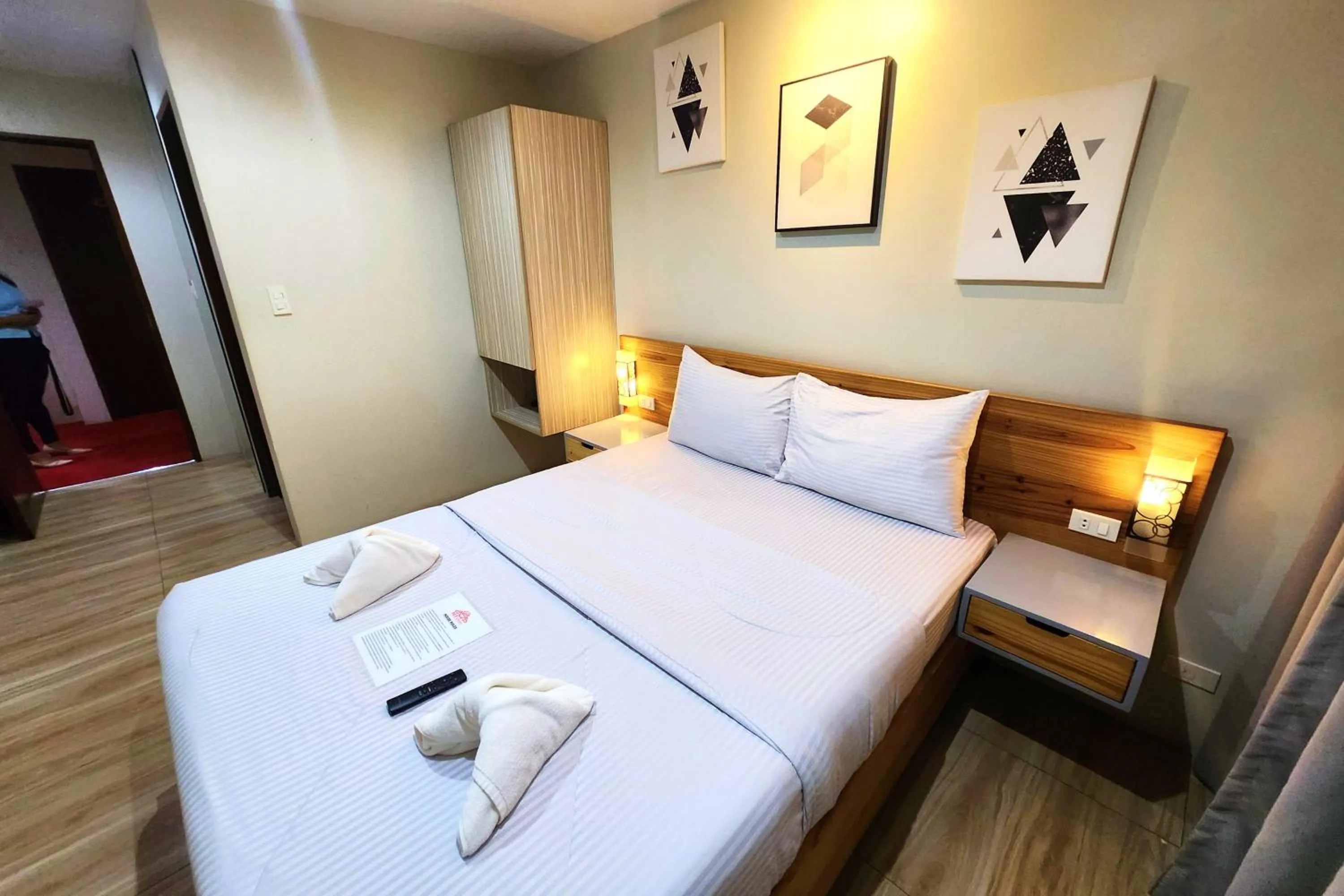 Bed in DLT Suites Cebu powered by Cocotel