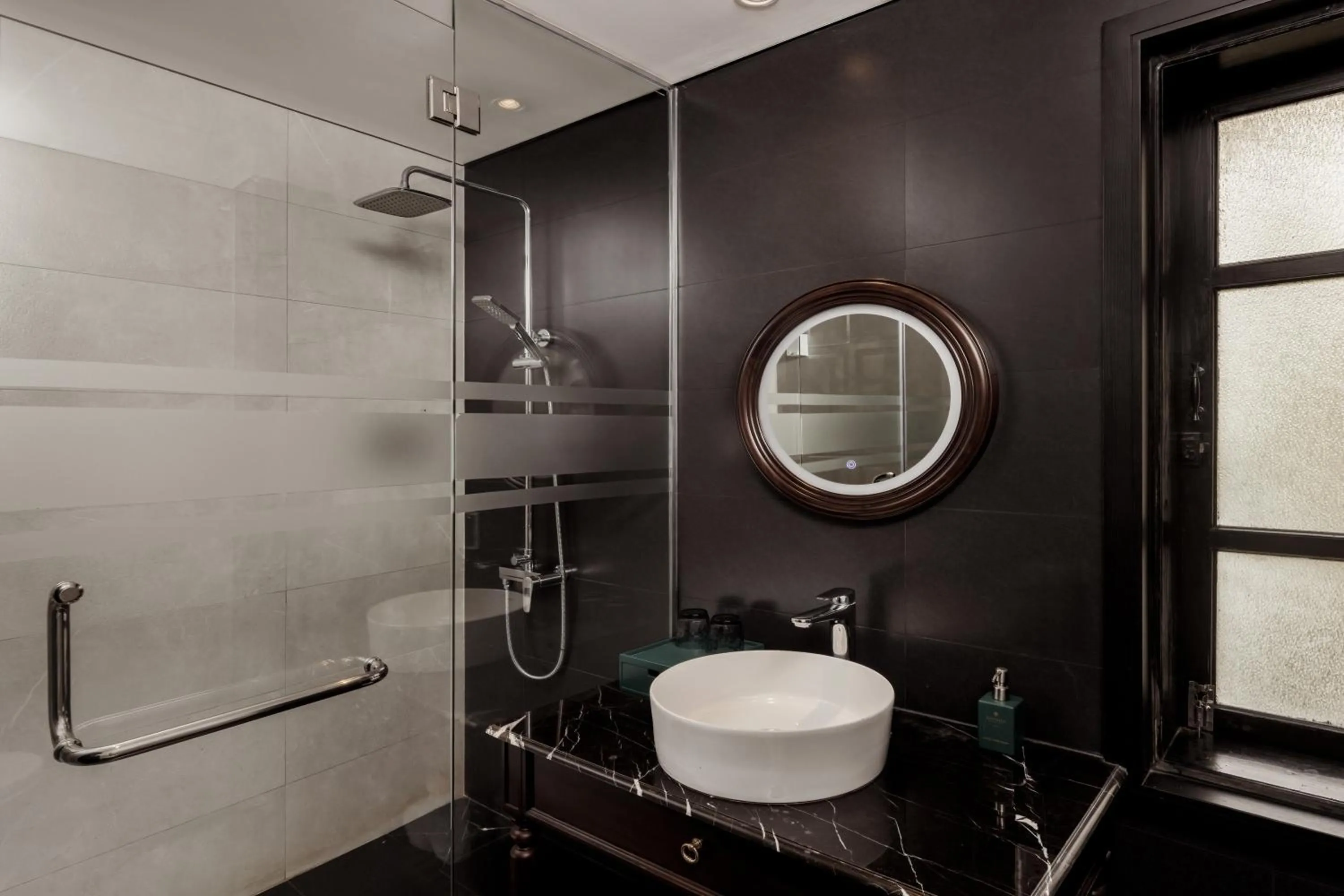 Shower in Anmira Resort & Spa Hoi An by The Unlimited Collection, Managed by the Ascott