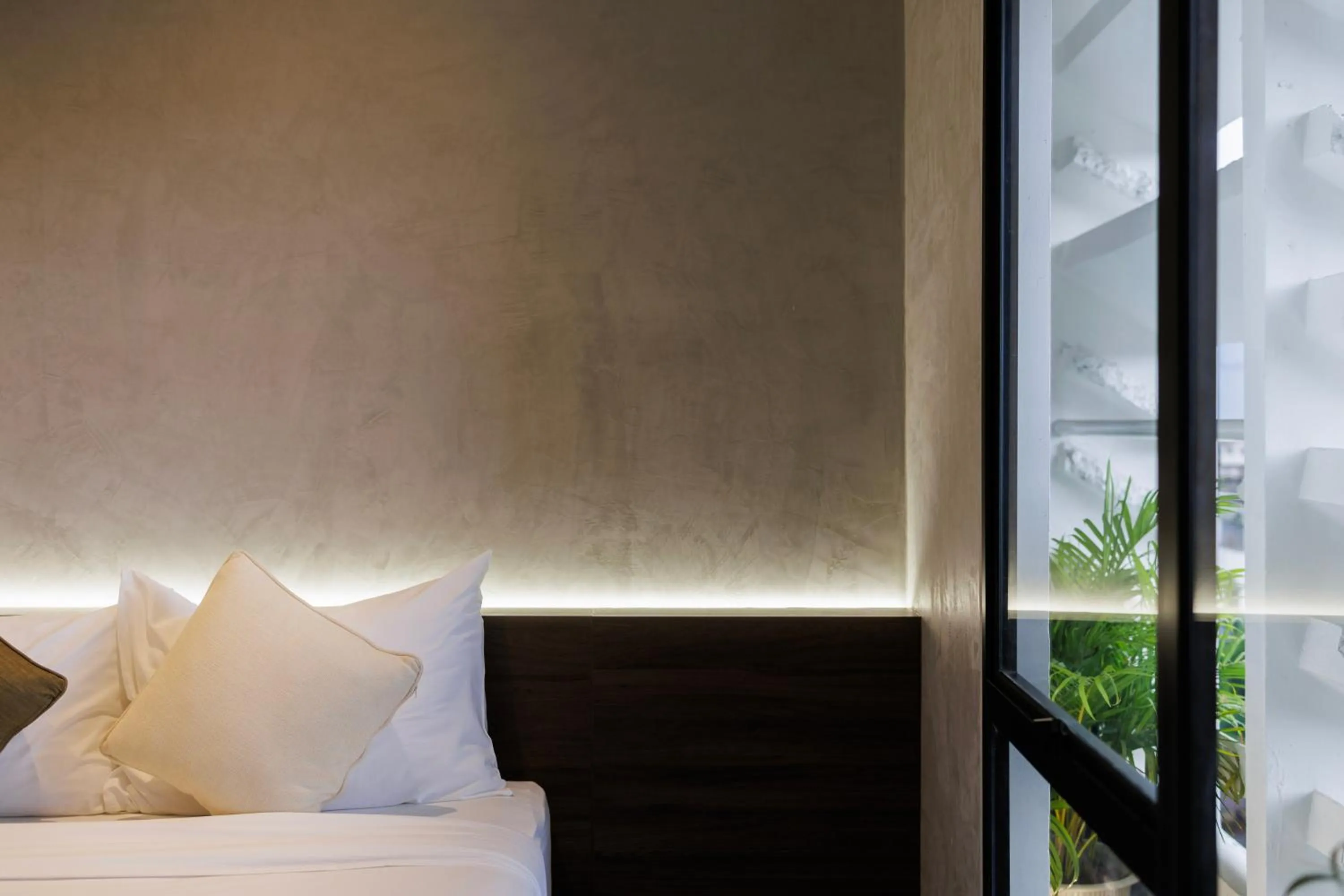 Bed in C'HOUSE Bangkok