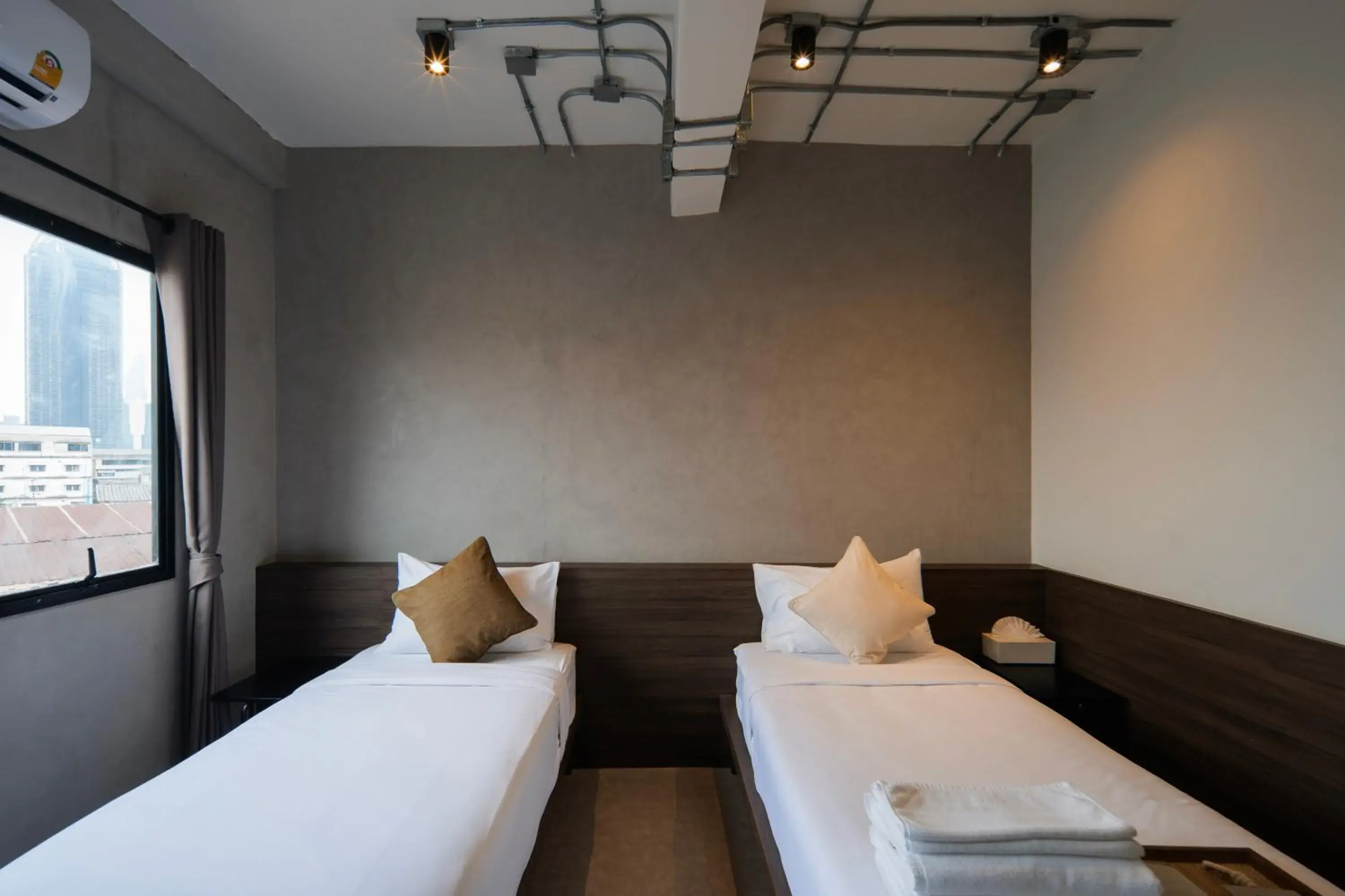 Standard Twin Room in C'HOUSE Bangkok Standard Twin Room in C'HOUSE Bangkok