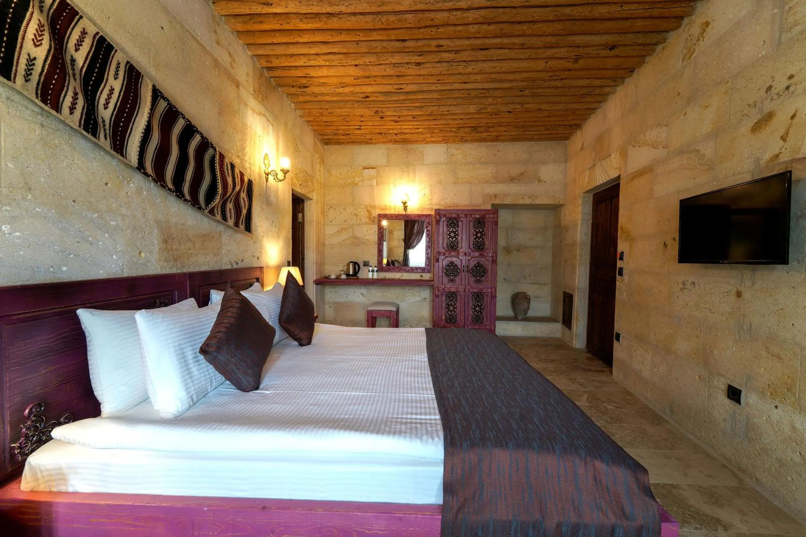 Bed in Doctor's Cave Cappadocia