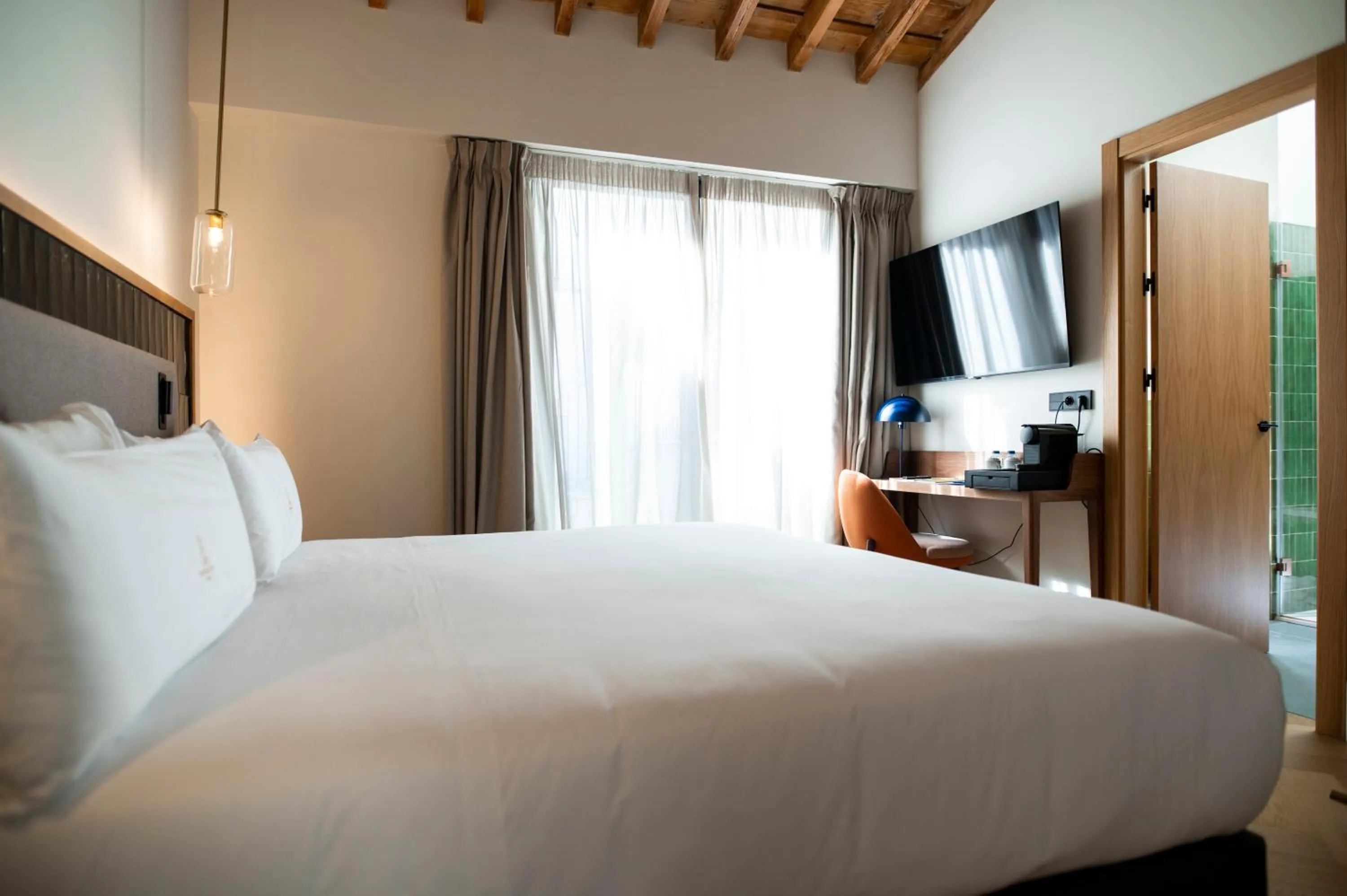 TV and multimedia, Bed in Legado Magdalena Hotel