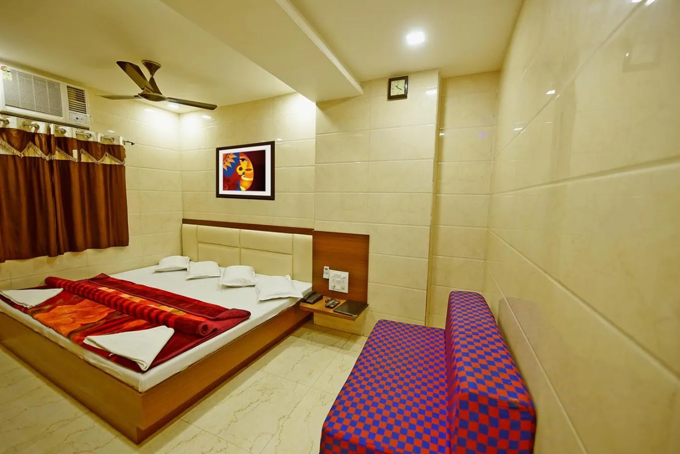 Bed in BABA GUEST HOUSE AJMER