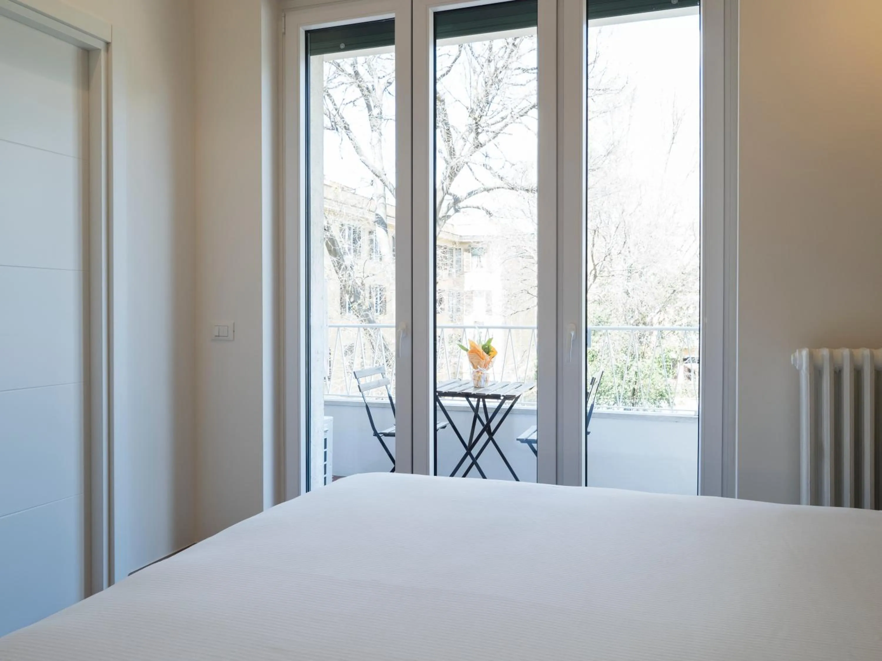 Bed in Savoia Rooms Roma