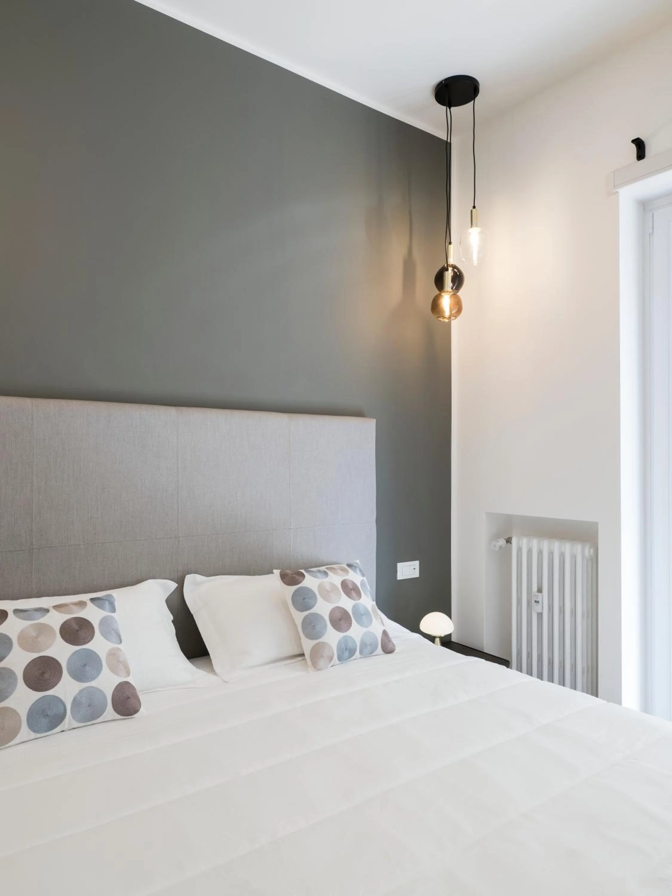 Bed in Savoia Rooms Roma