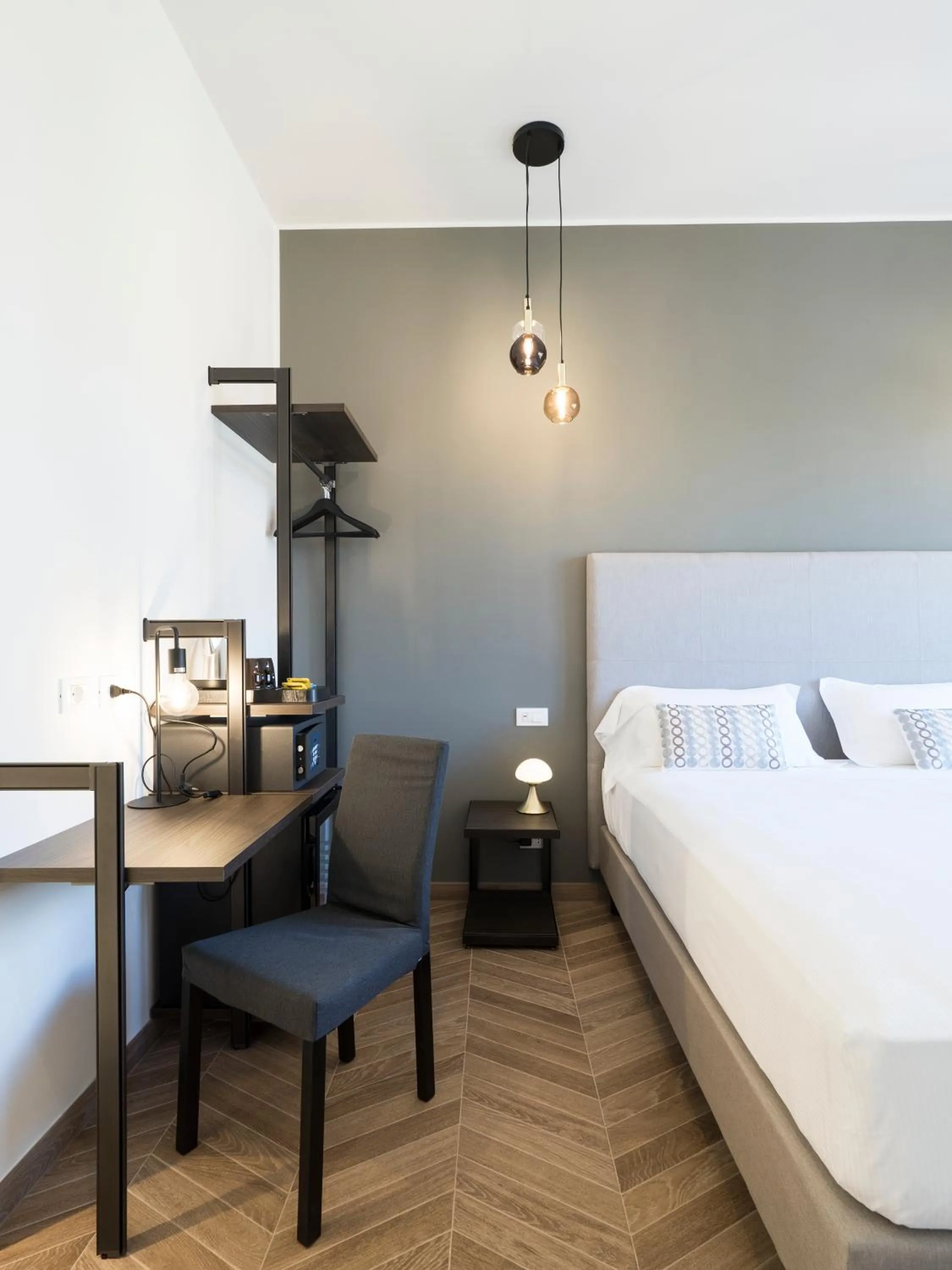 Bed in Savoia Rooms Roma