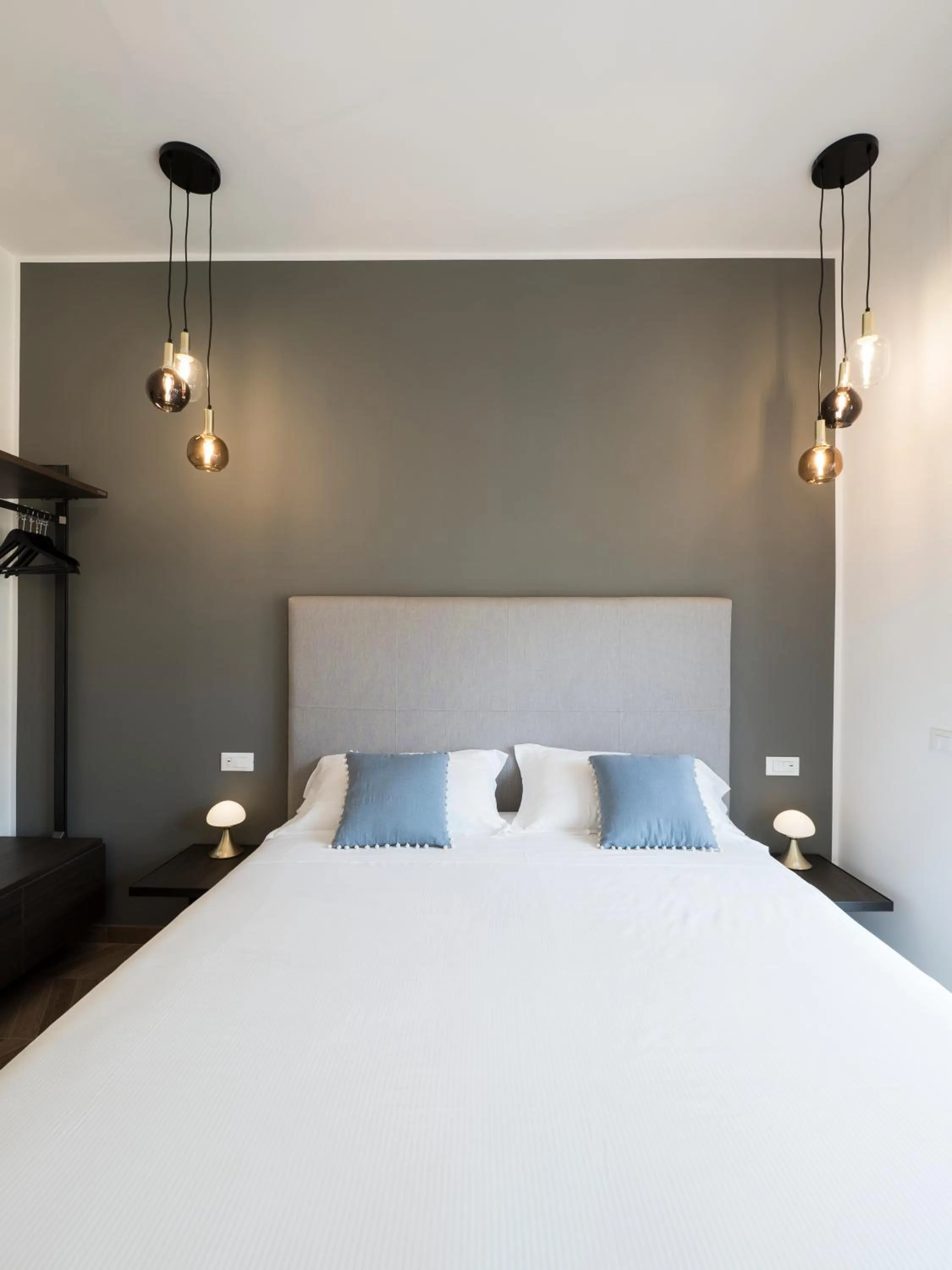 Bed in Savoia Rooms Roma