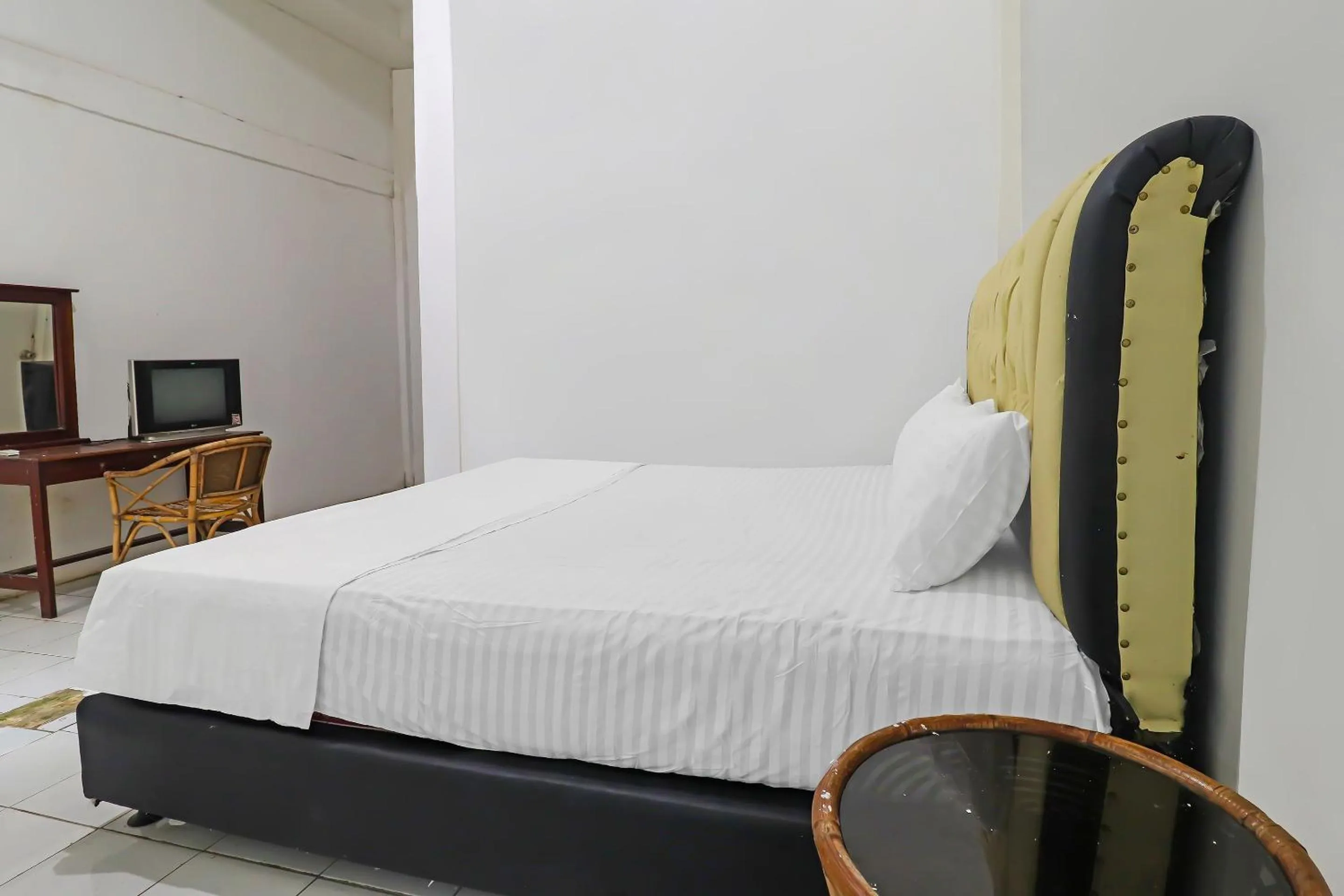 Bedroom in Hotel O Wisma Permata Syariah