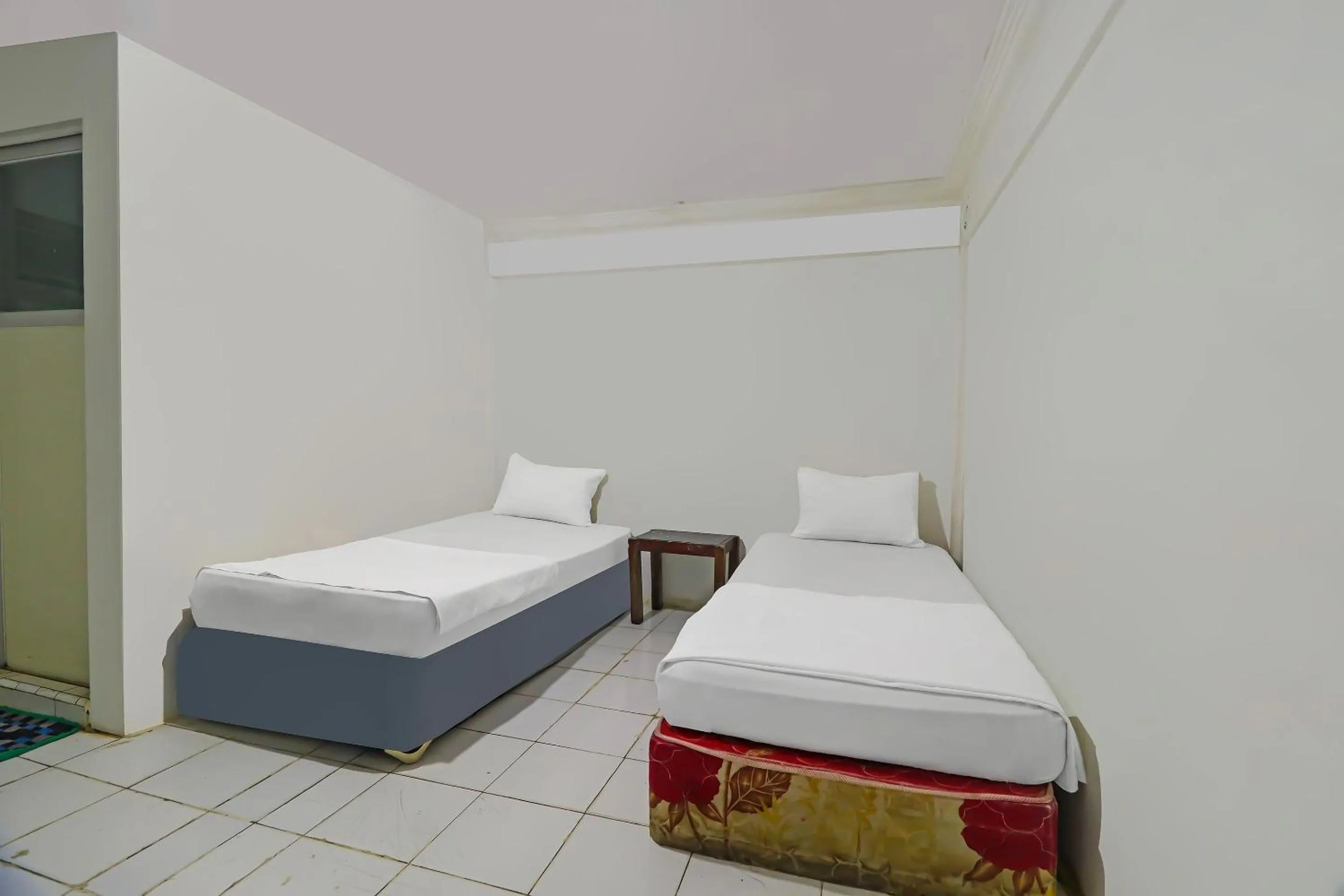 Bedroom in Hotel O Wisma Permata Syariah