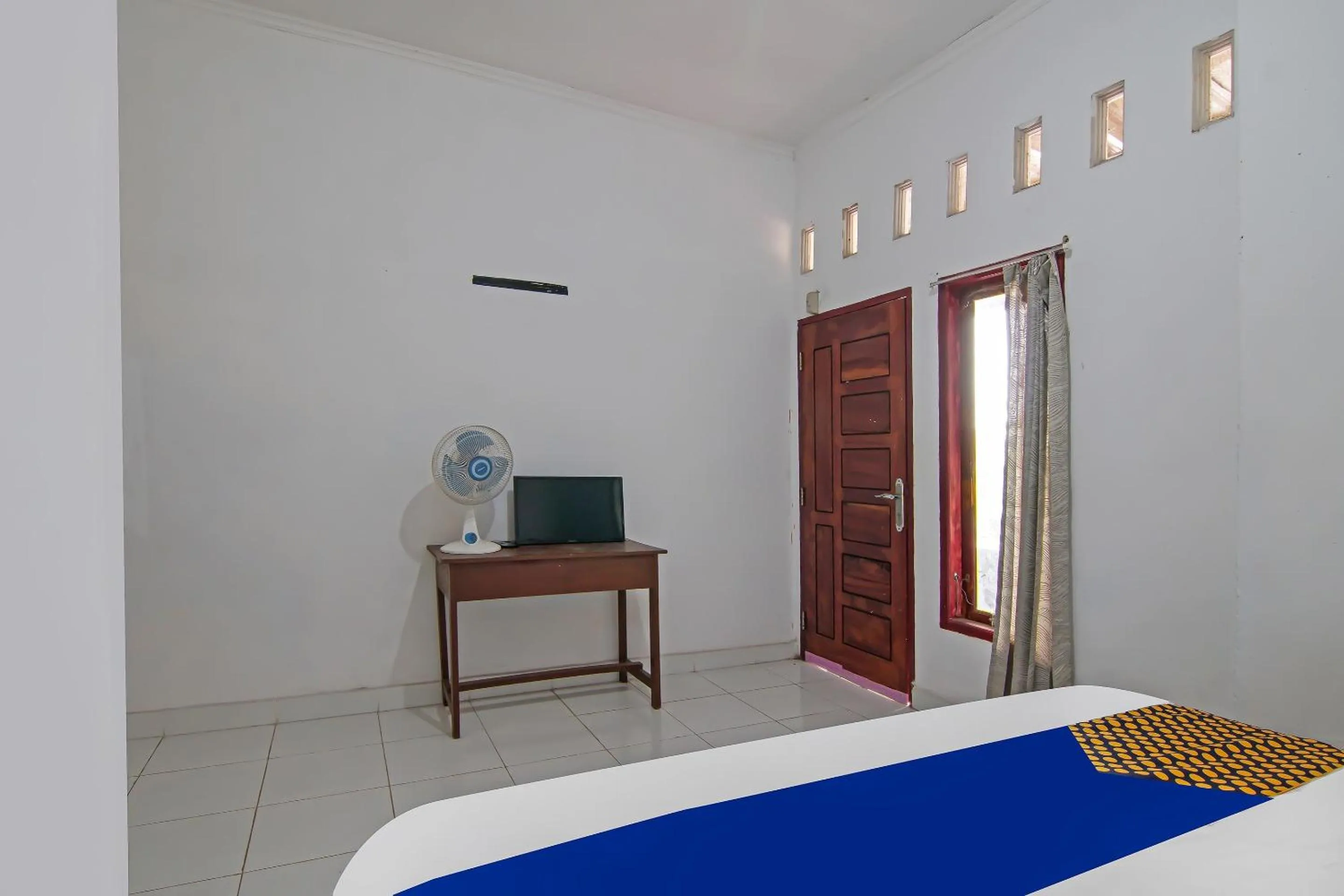 Bedroom in SPOT ON 92498 Fanni Homestay