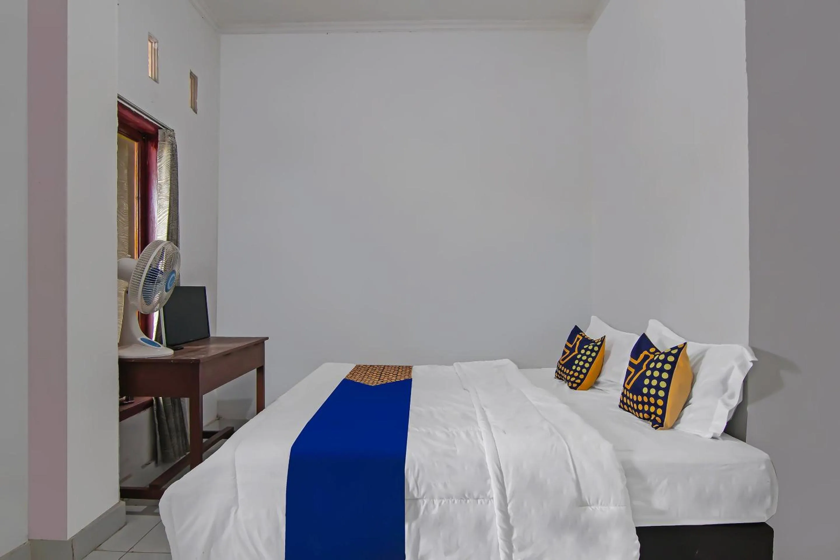 Bedroom in SPOT ON 92498 Fanni Homestay