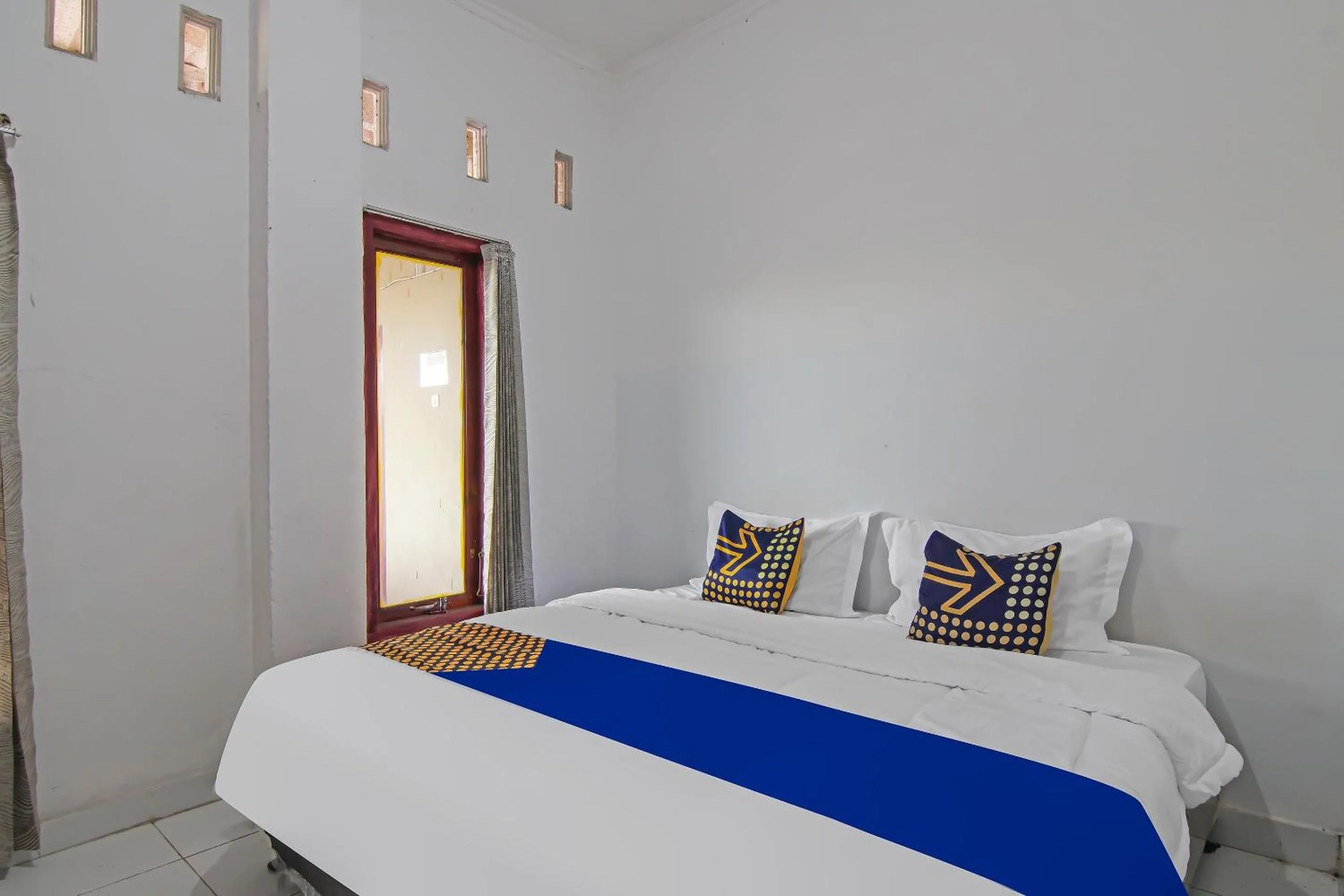 Bedroom in SPOT ON 92498 Fanni Homestay