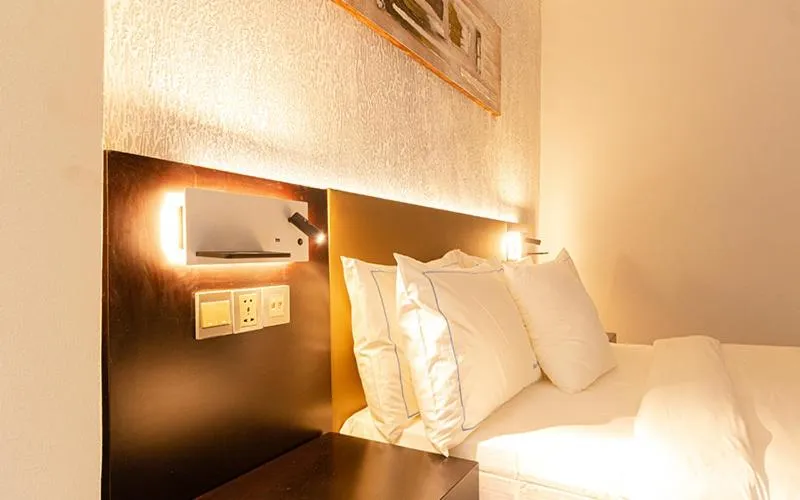 Bed in Hotel Le Figaro