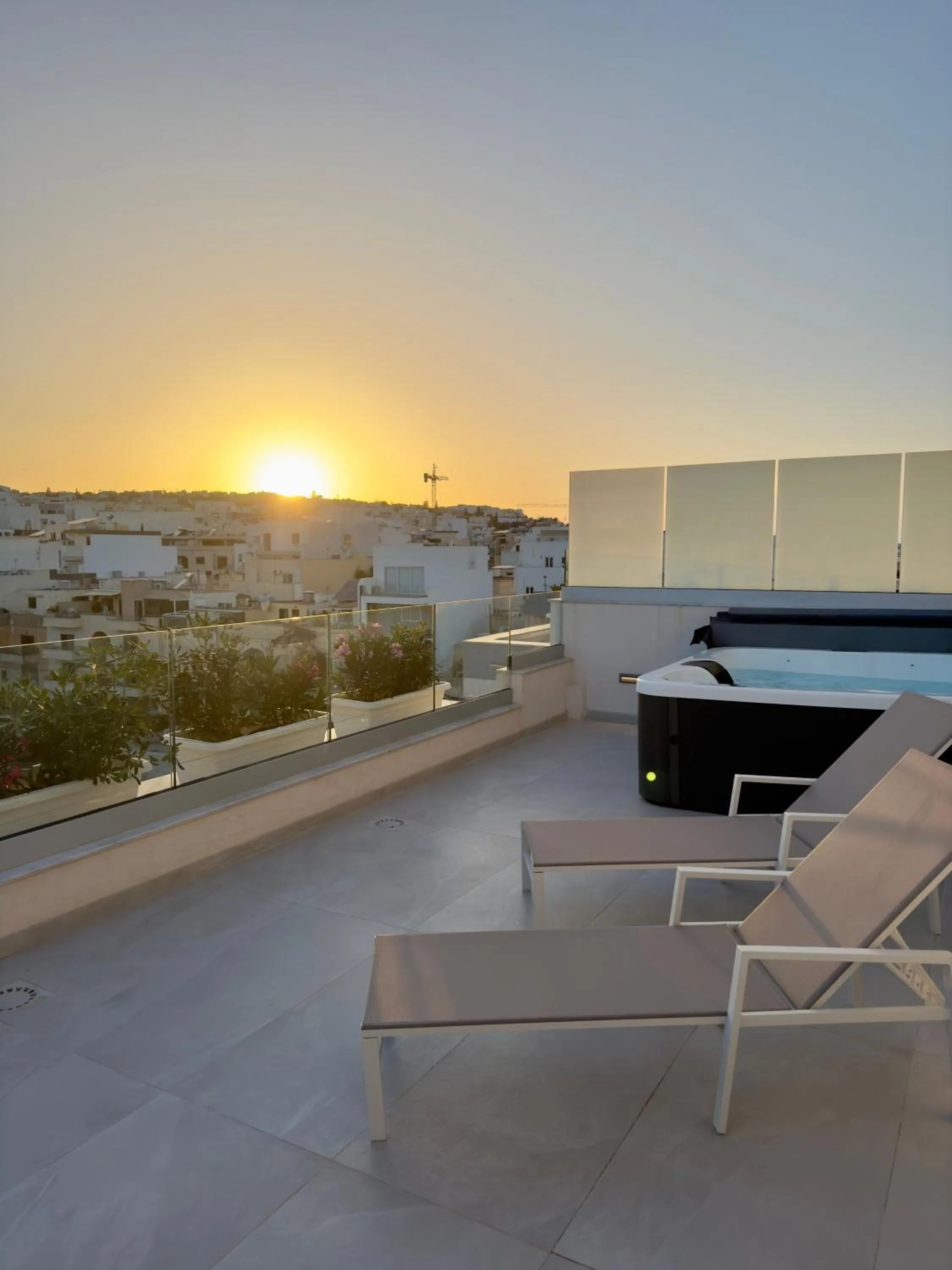 Sunset in C'est La Vie Boutik Swieqi