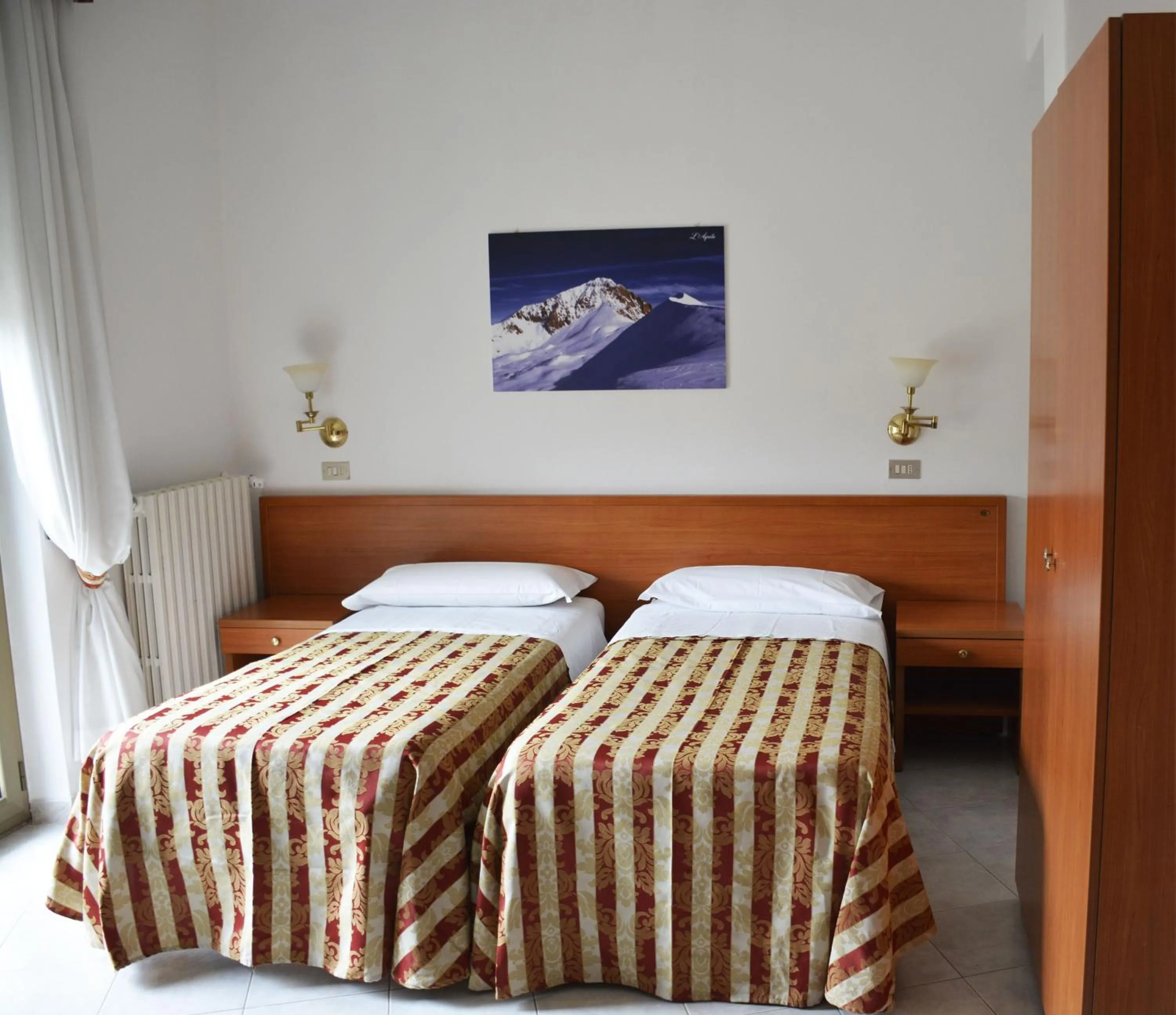 Bed in Hotel Aquila