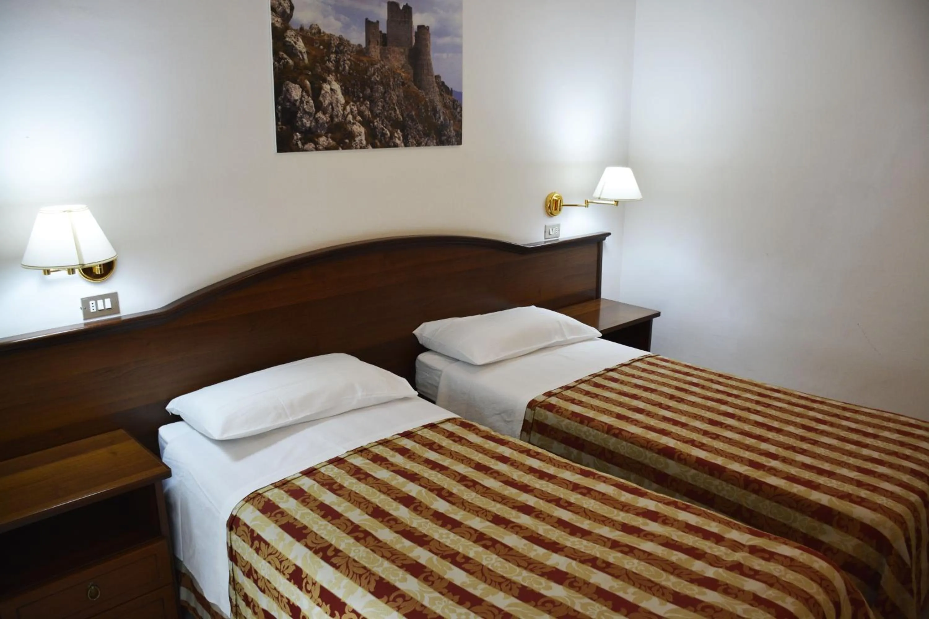 Bed in Hotel Aquila