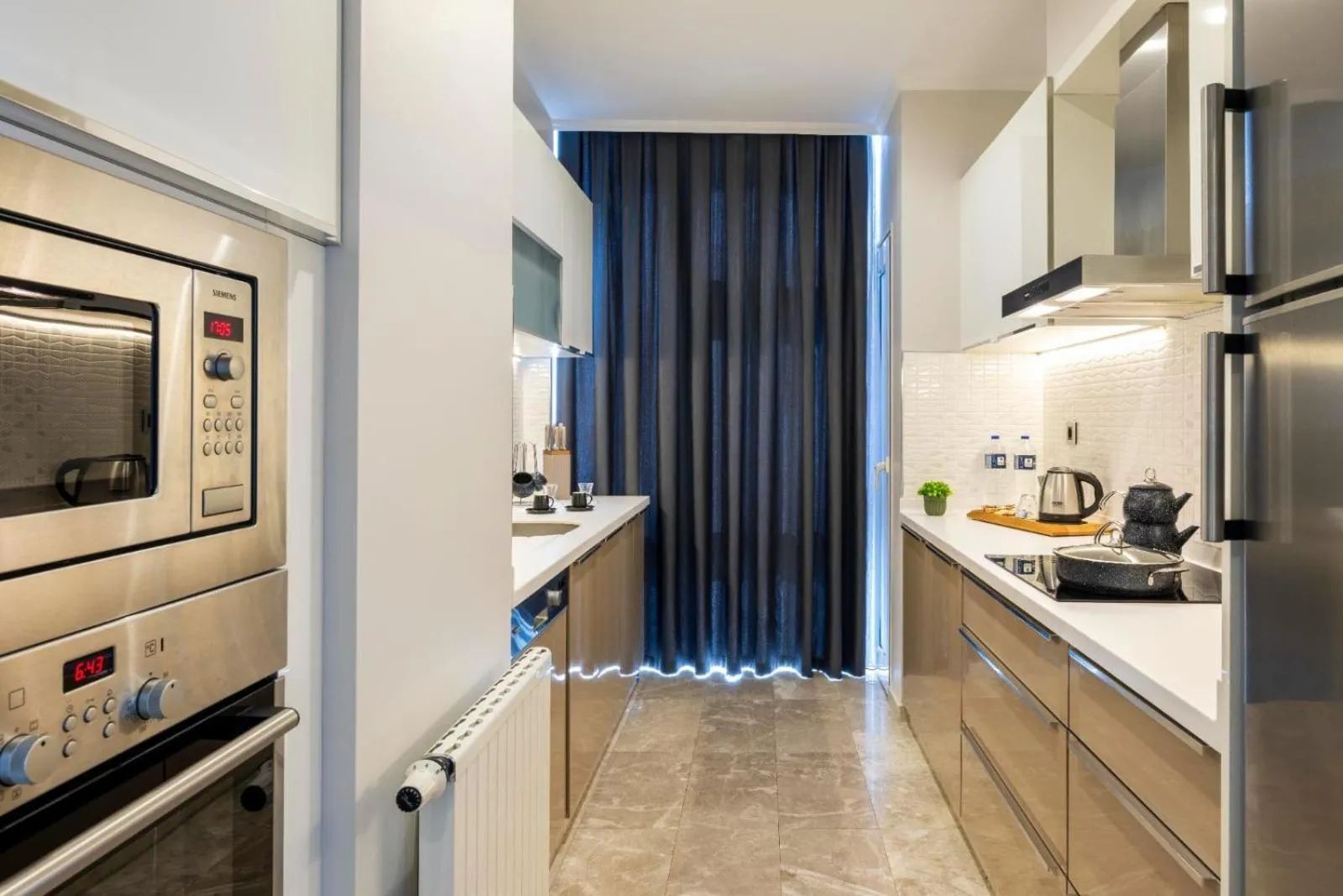 Kitchen or kitchenette in Mayar Residence Hotel