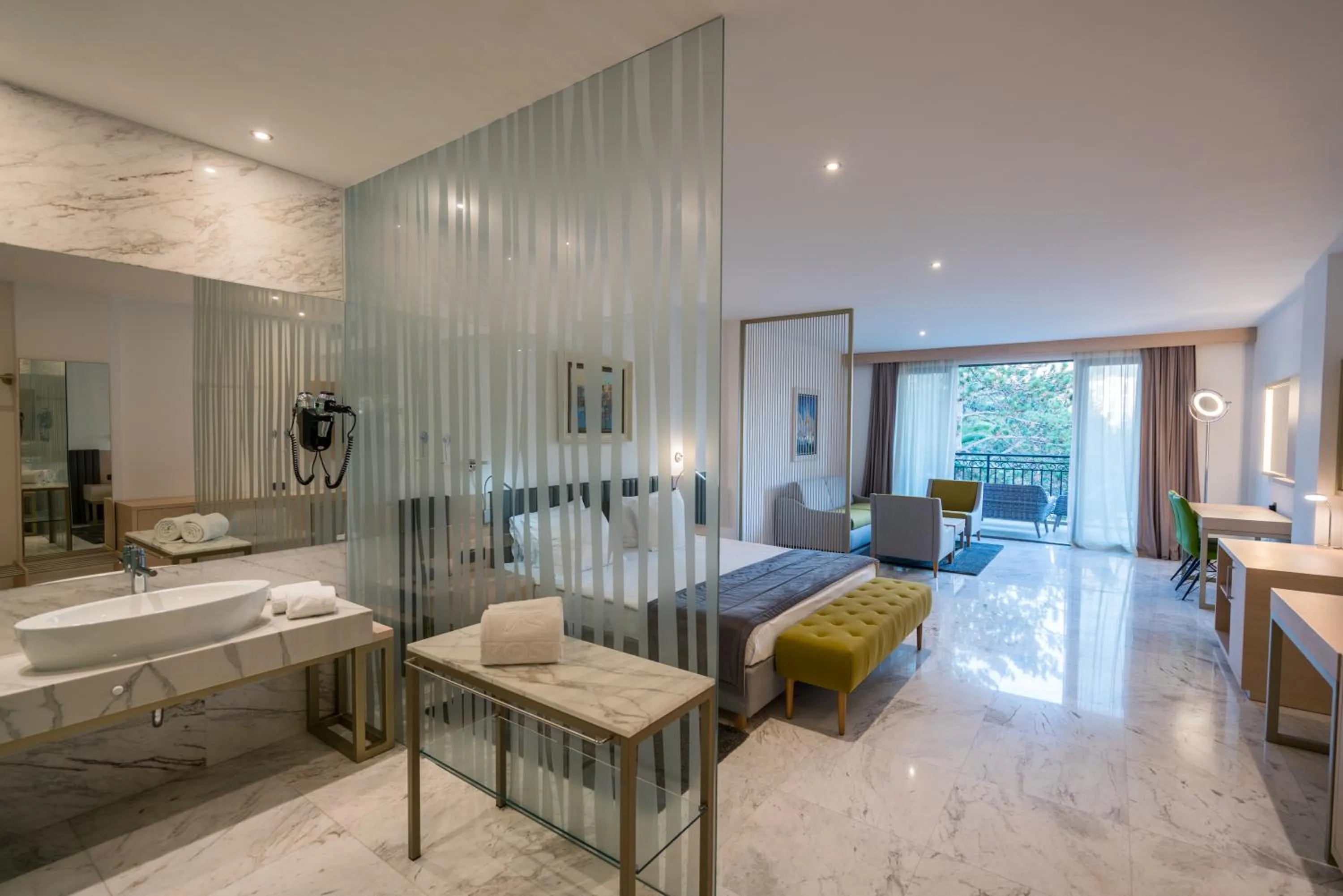 Seating area, Bed in Iberostar Waves Bellevue All Inclusive