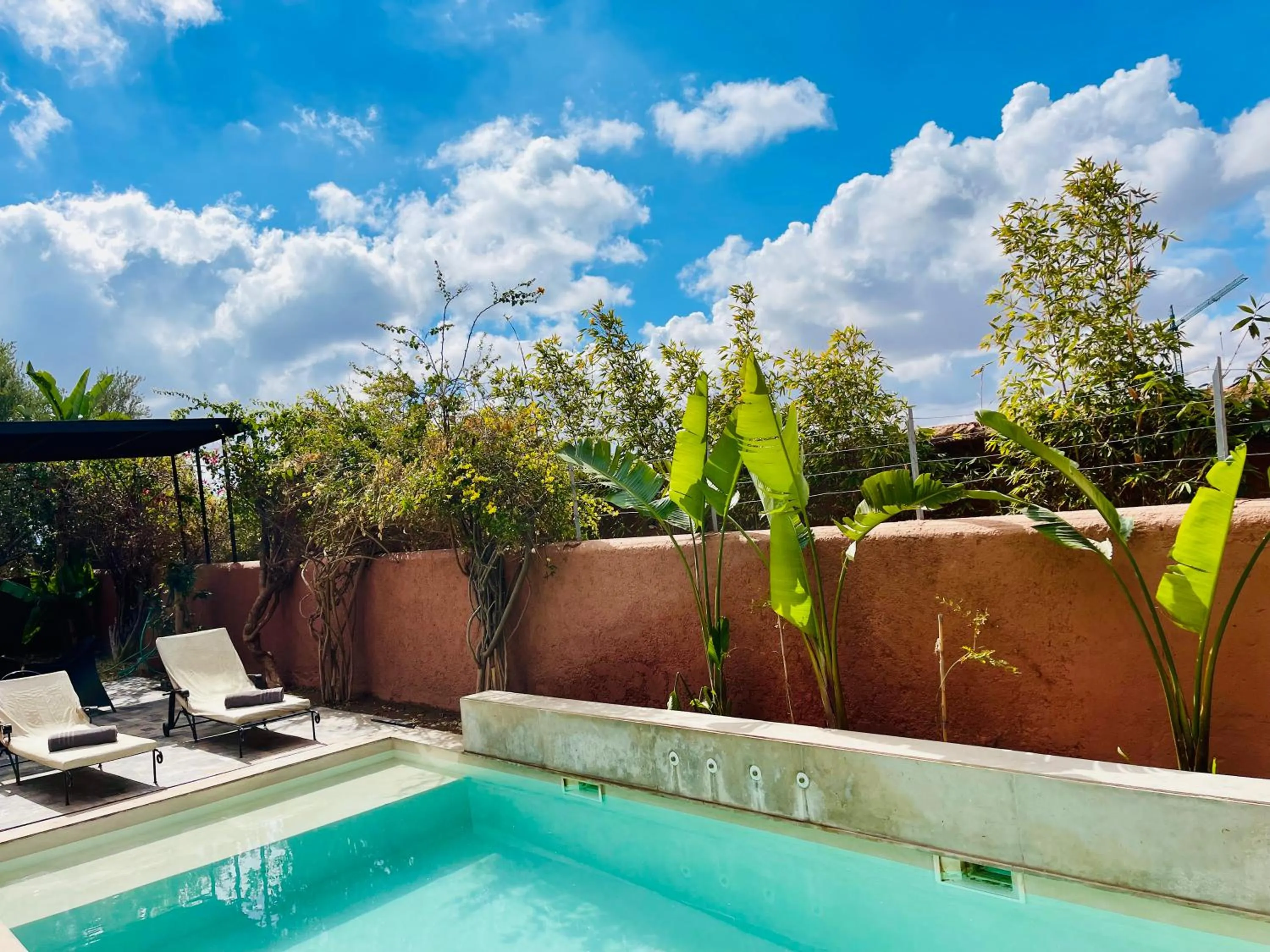 Swimming pool in Les Jardins de Kesali By La Siredrah