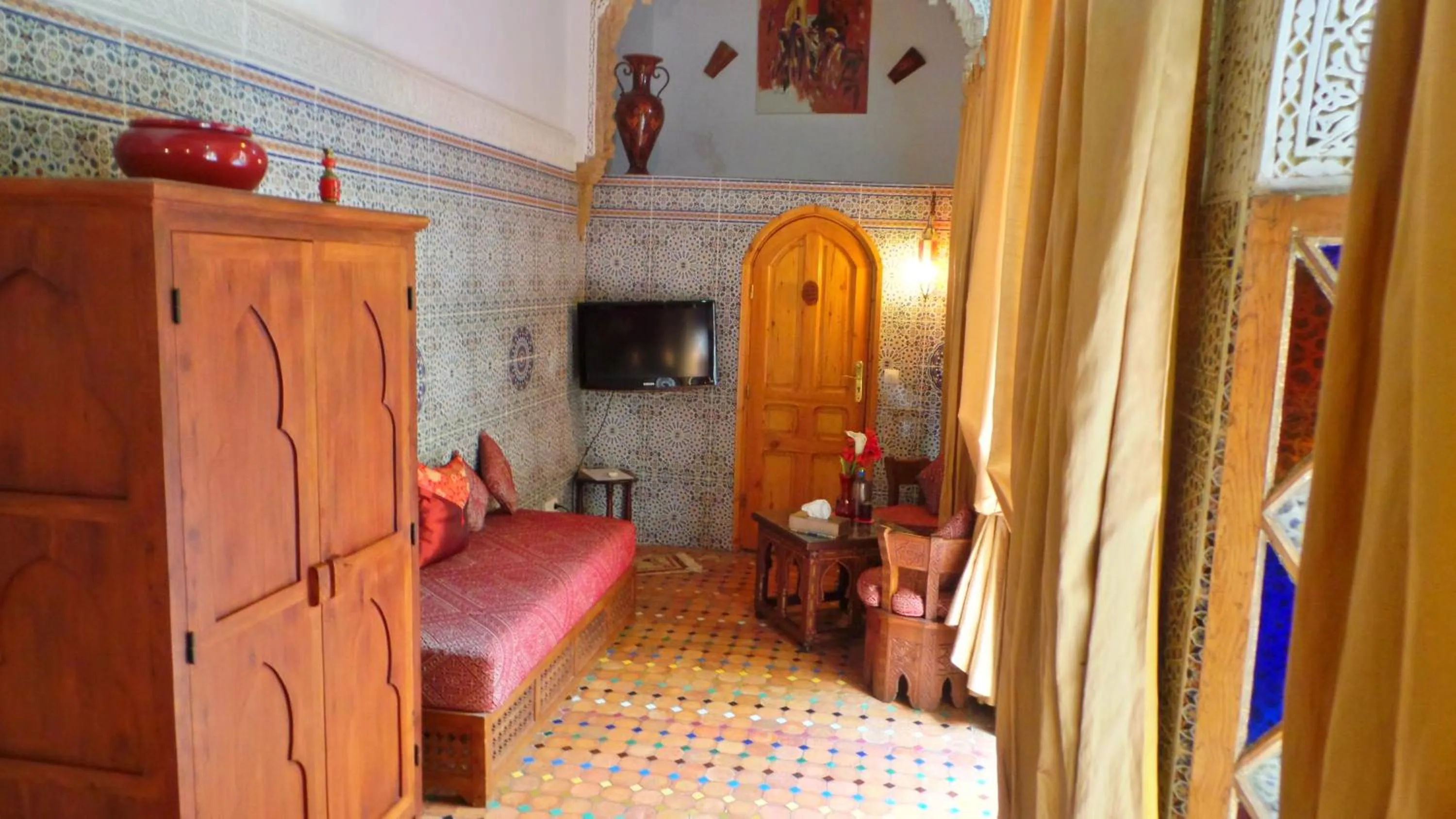 Living room, Bed in Riad Dar Zouhour