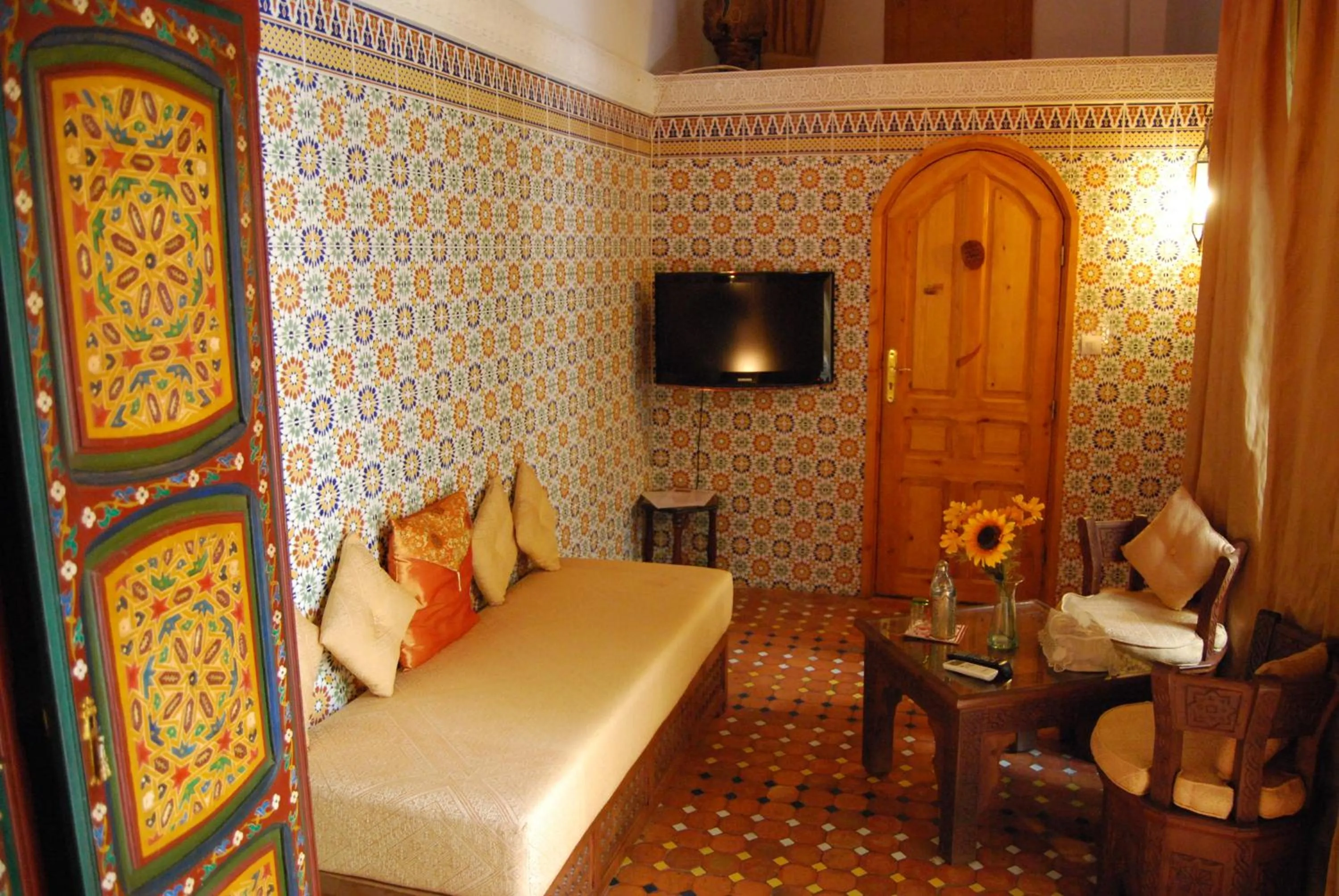 Living room, Bed in Riad Dar Zouhour