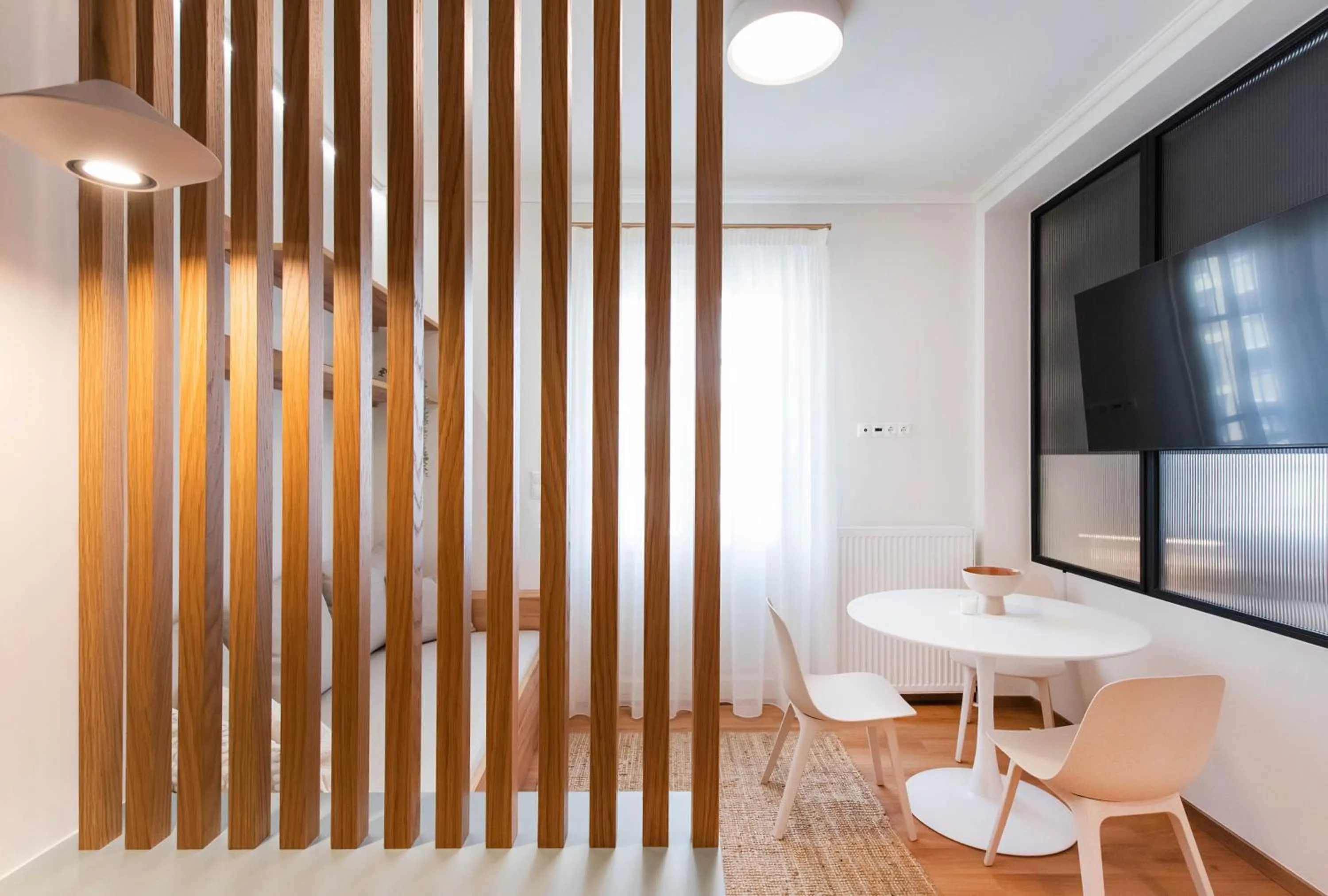 TV and multimedia in White Lotus by halu! Apartments