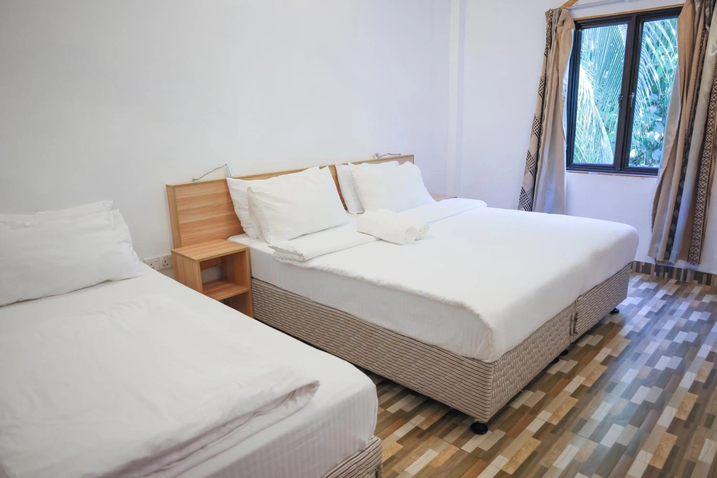 Bed in Golhaaviewinn