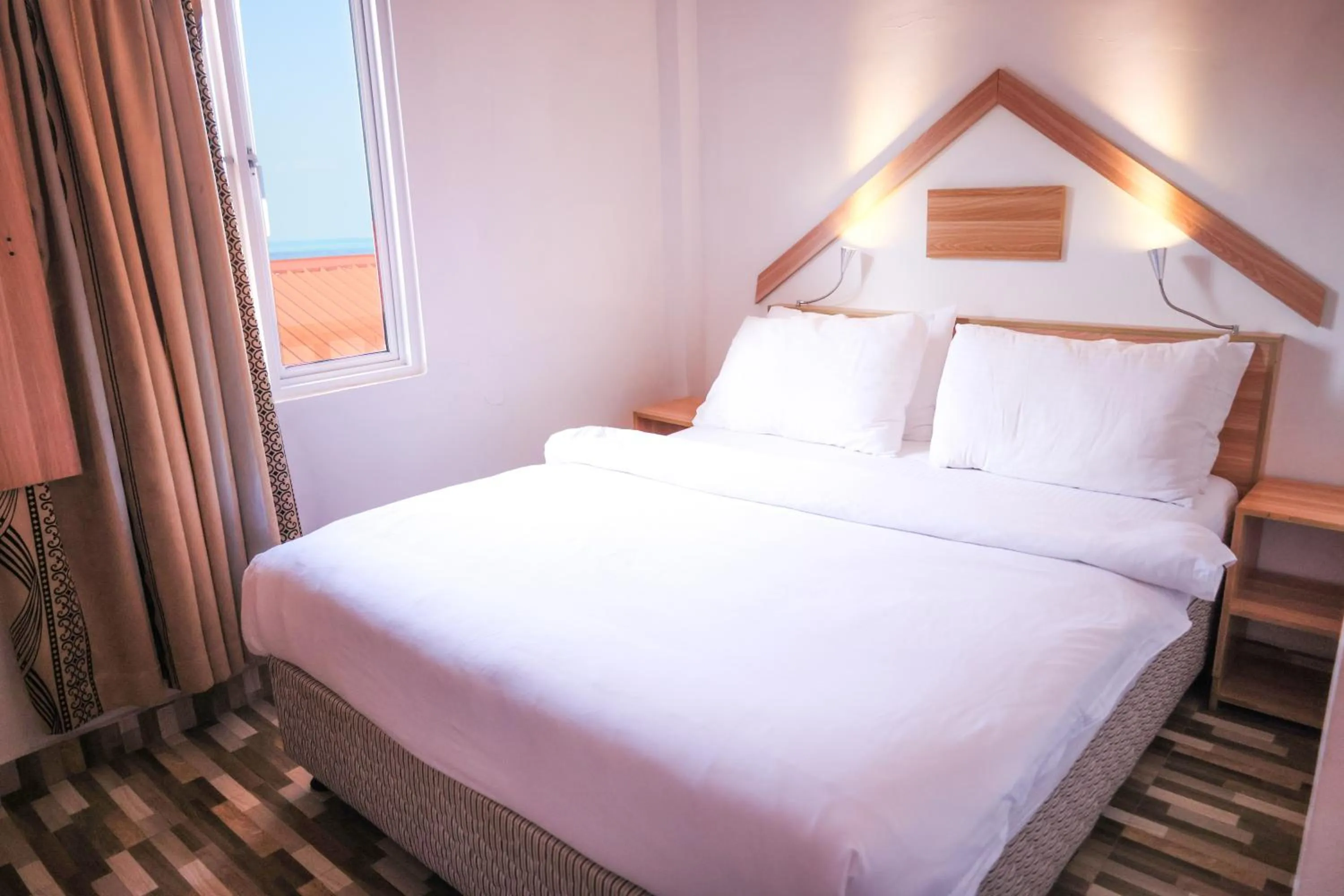 Bed in Golhaaviewinn