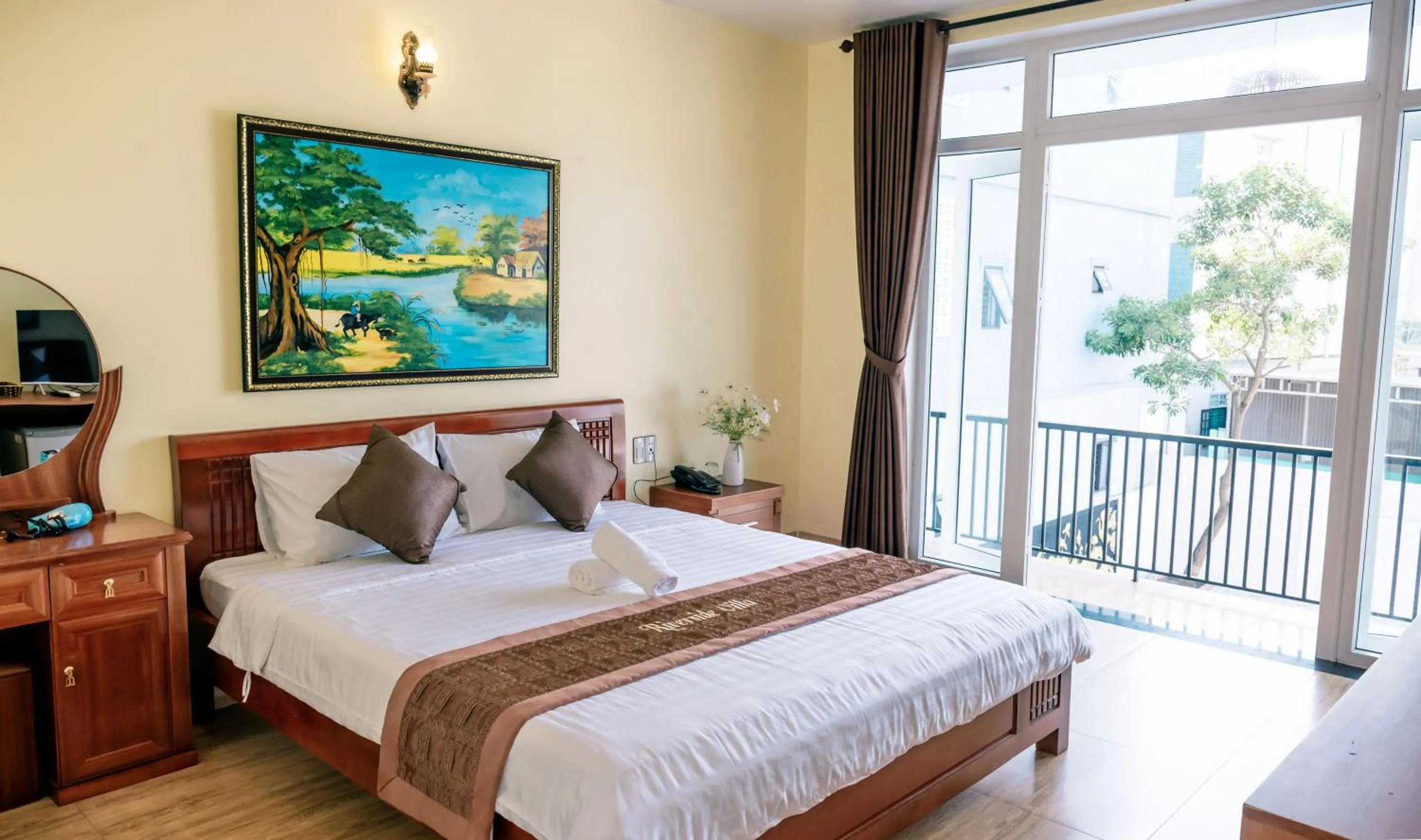 Bed in Orchid Riverside Villa