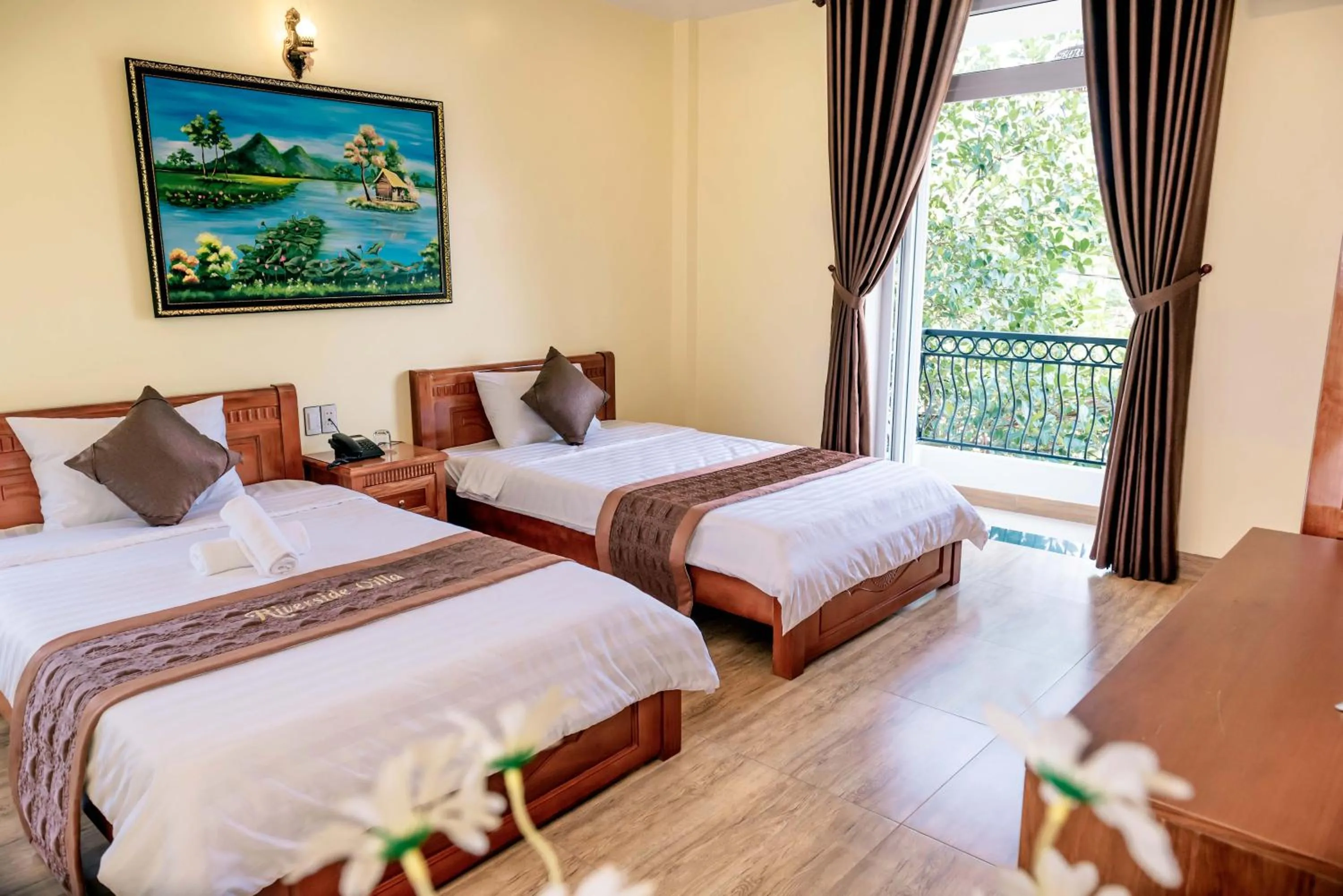 Bed in Orchid Riverside Villa