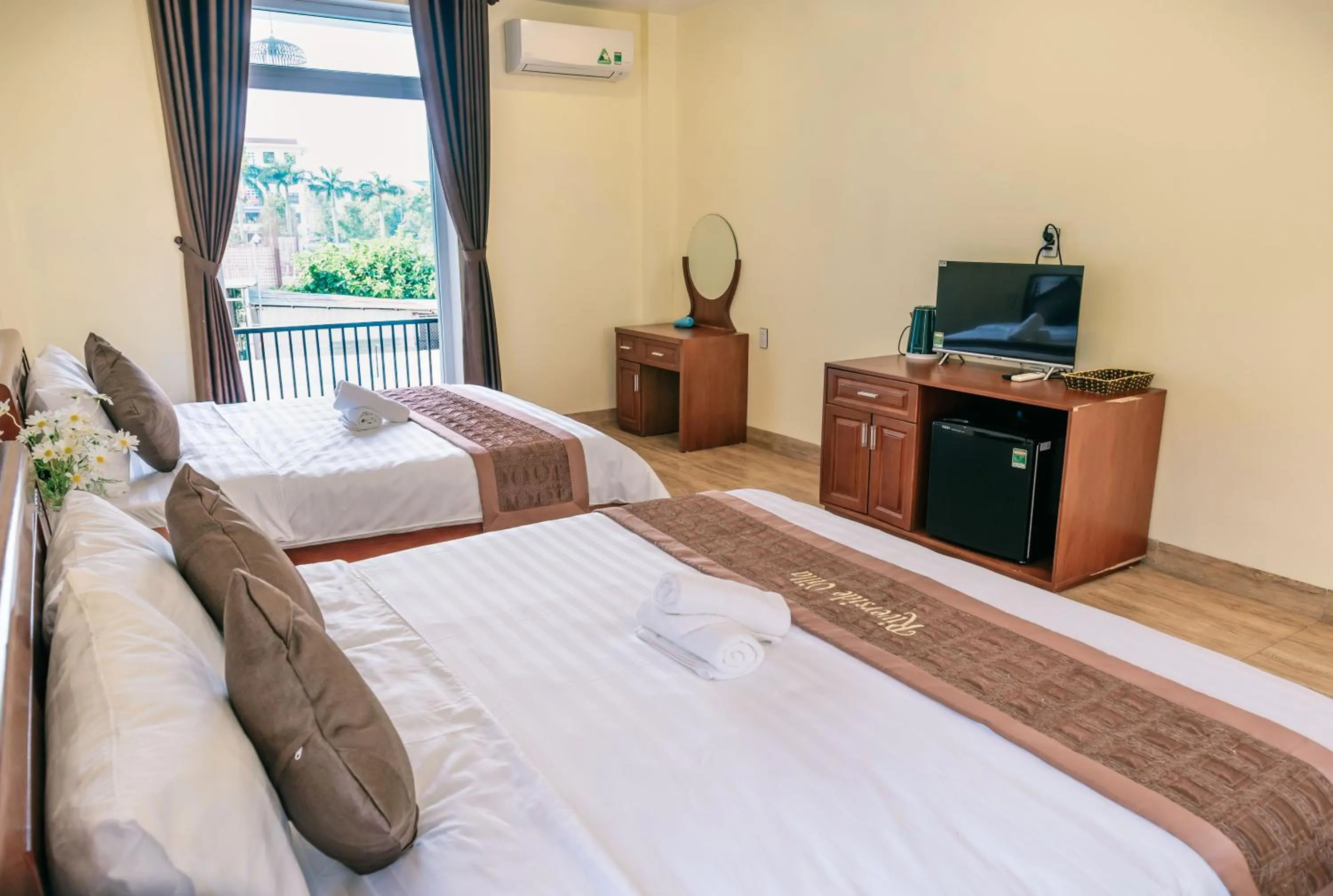 Bed in Orchid Riverside Villa