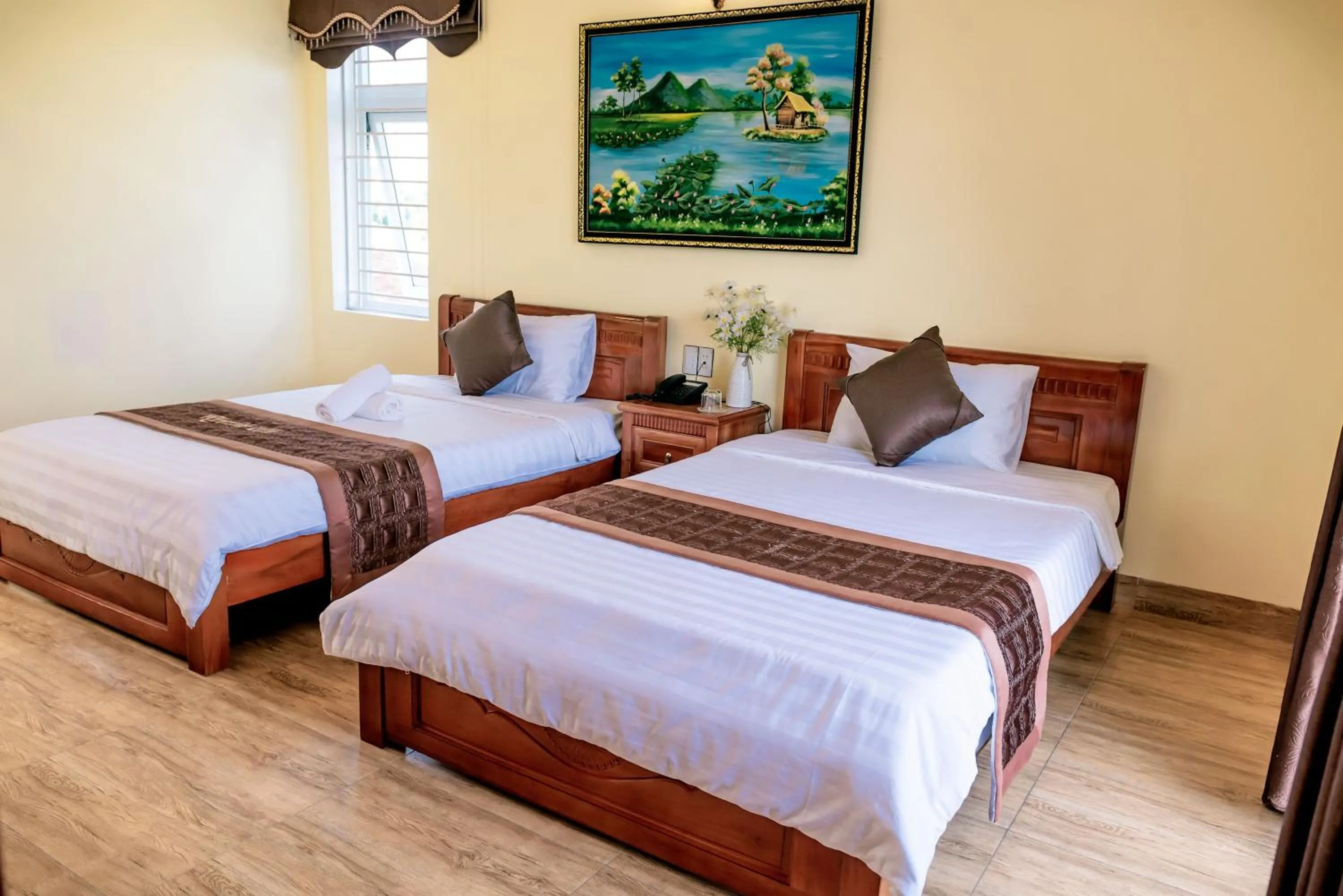 Bed in Orchid Riverside Villa