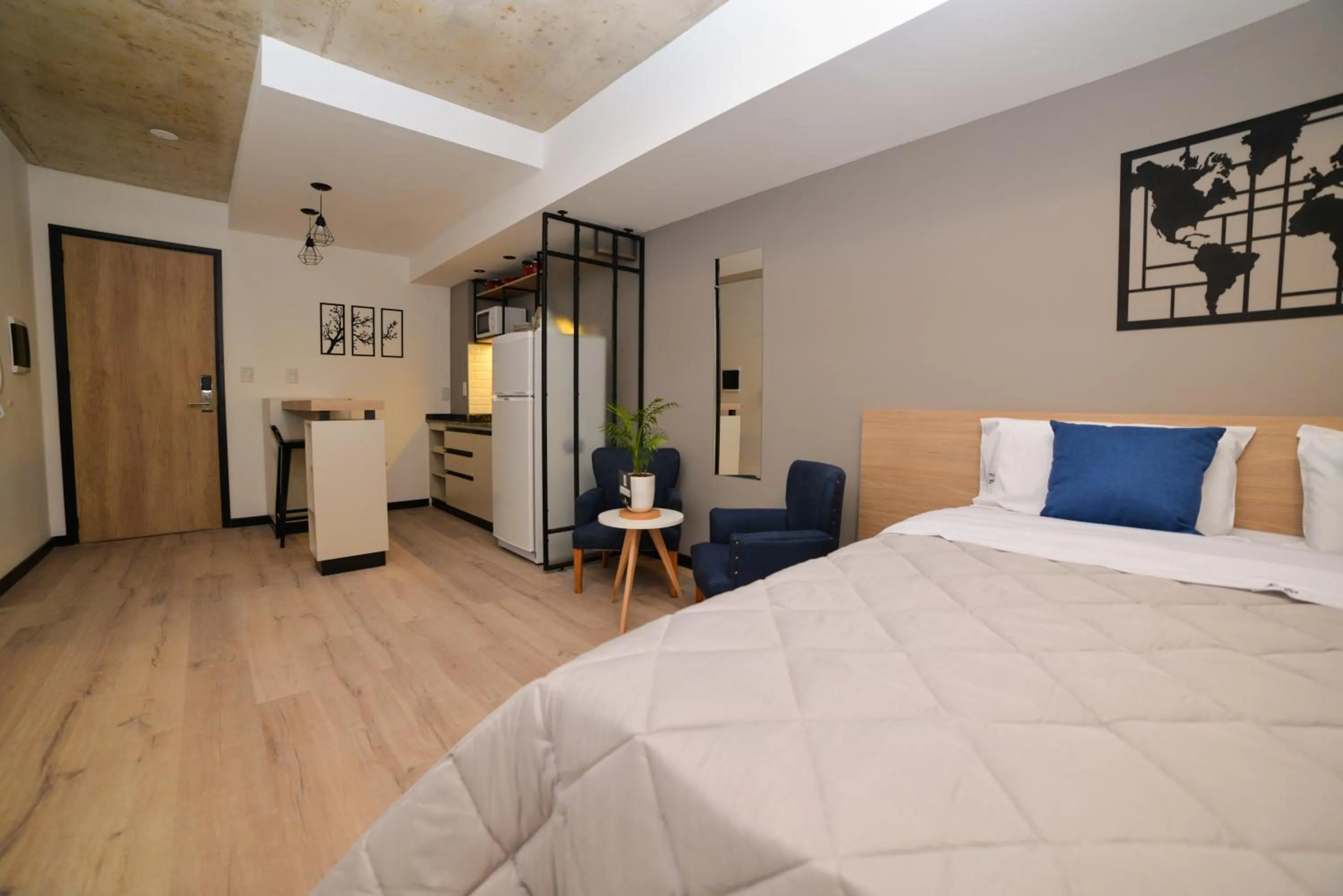 Living room, Bed in Distrito A FMA-Coliving