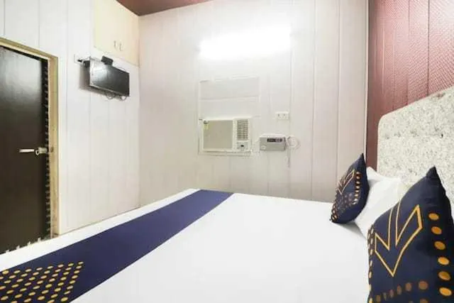 Bedroom in Hotel O Home Aradhya Residency