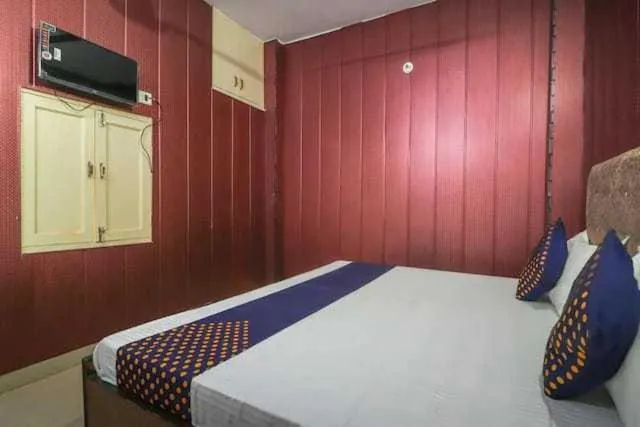 Bedroom in Hotel O Home Aradhya Residency