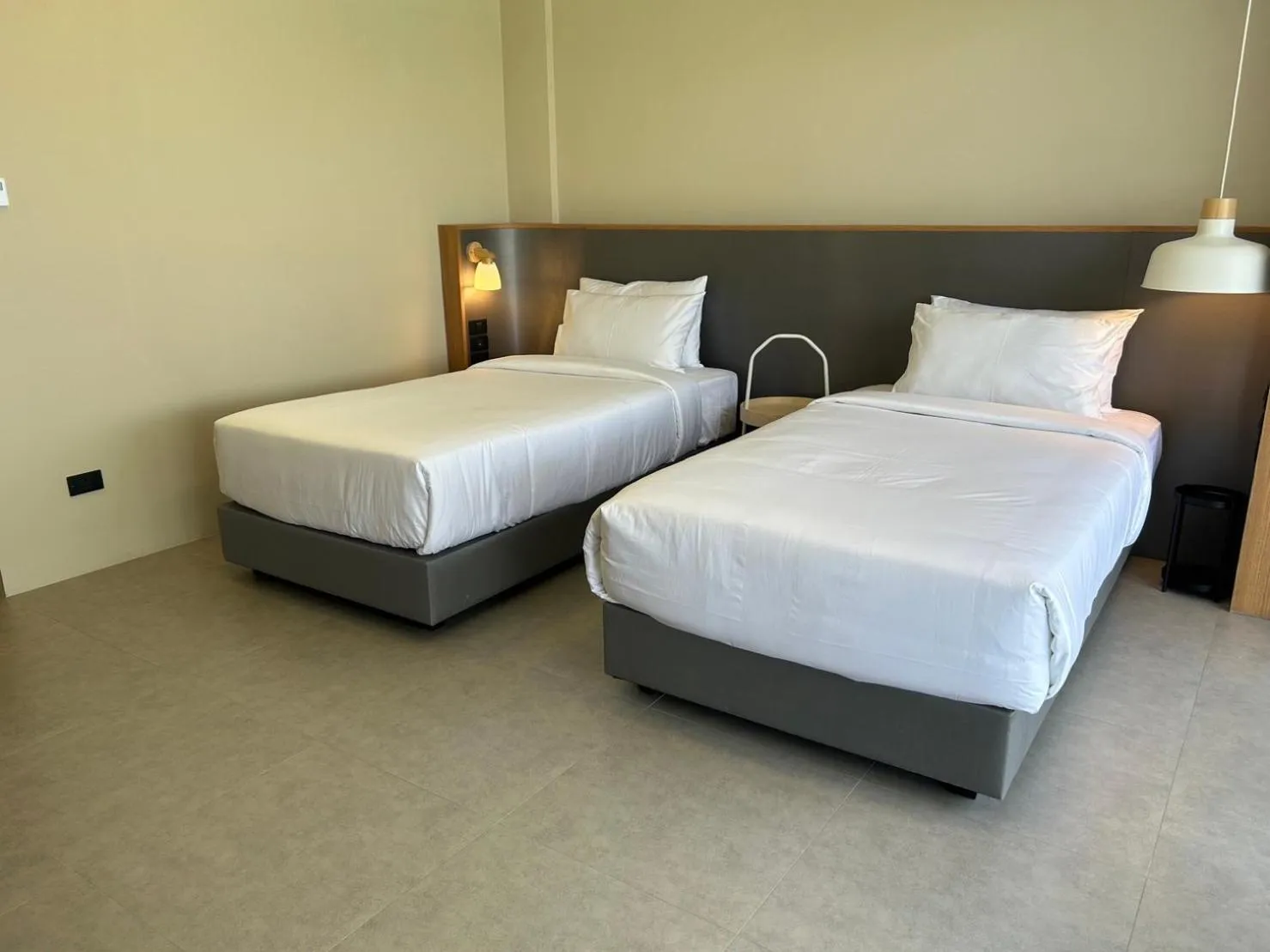 Photo of the whole room, Bed in Raintree Boutique