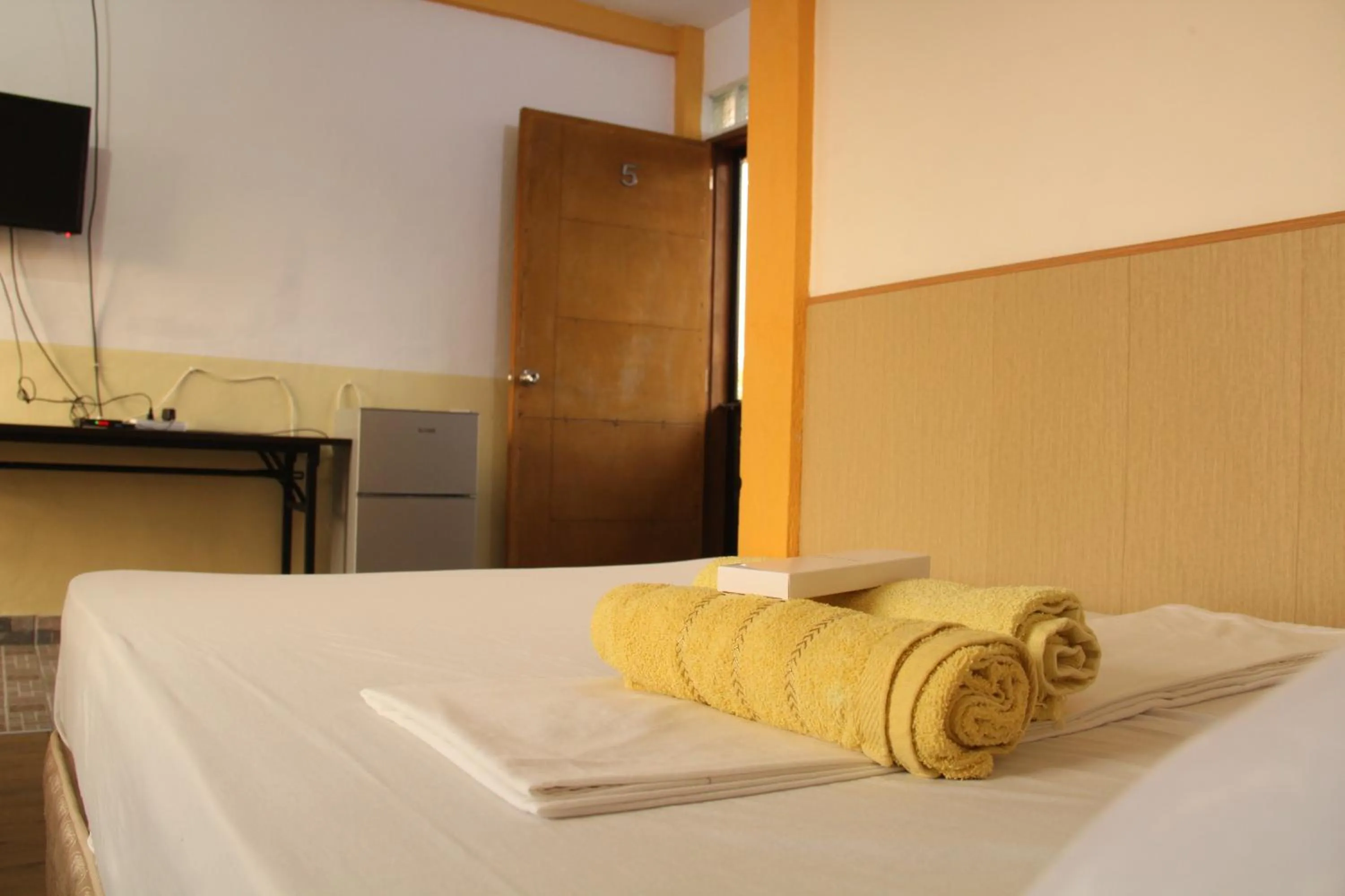 Bed in Good Guys Beach Resort