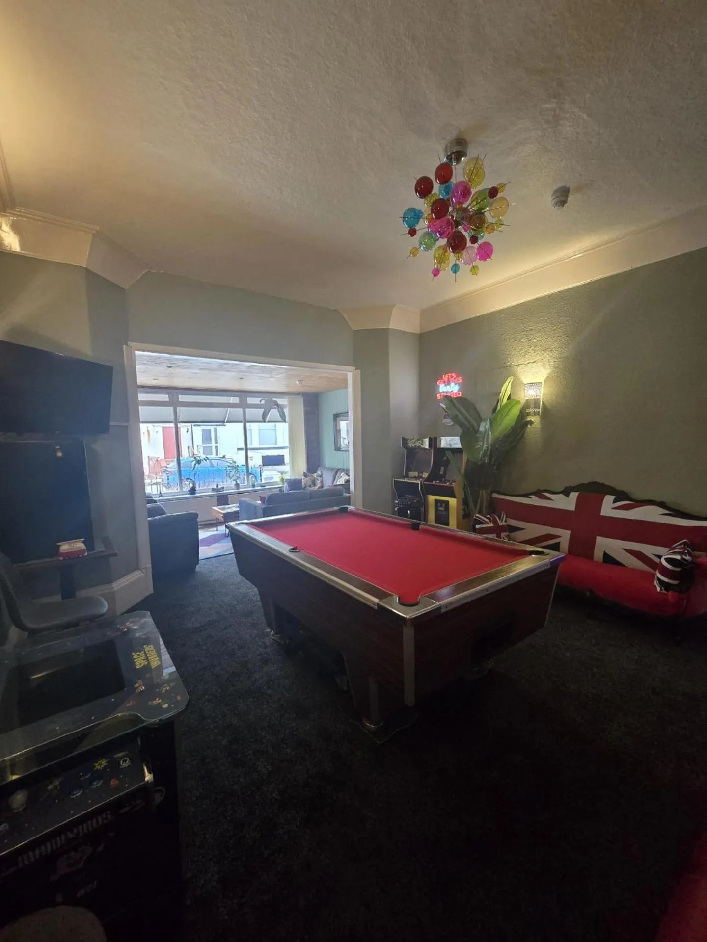 Communal lounge/ TV room in Maydene Hotel