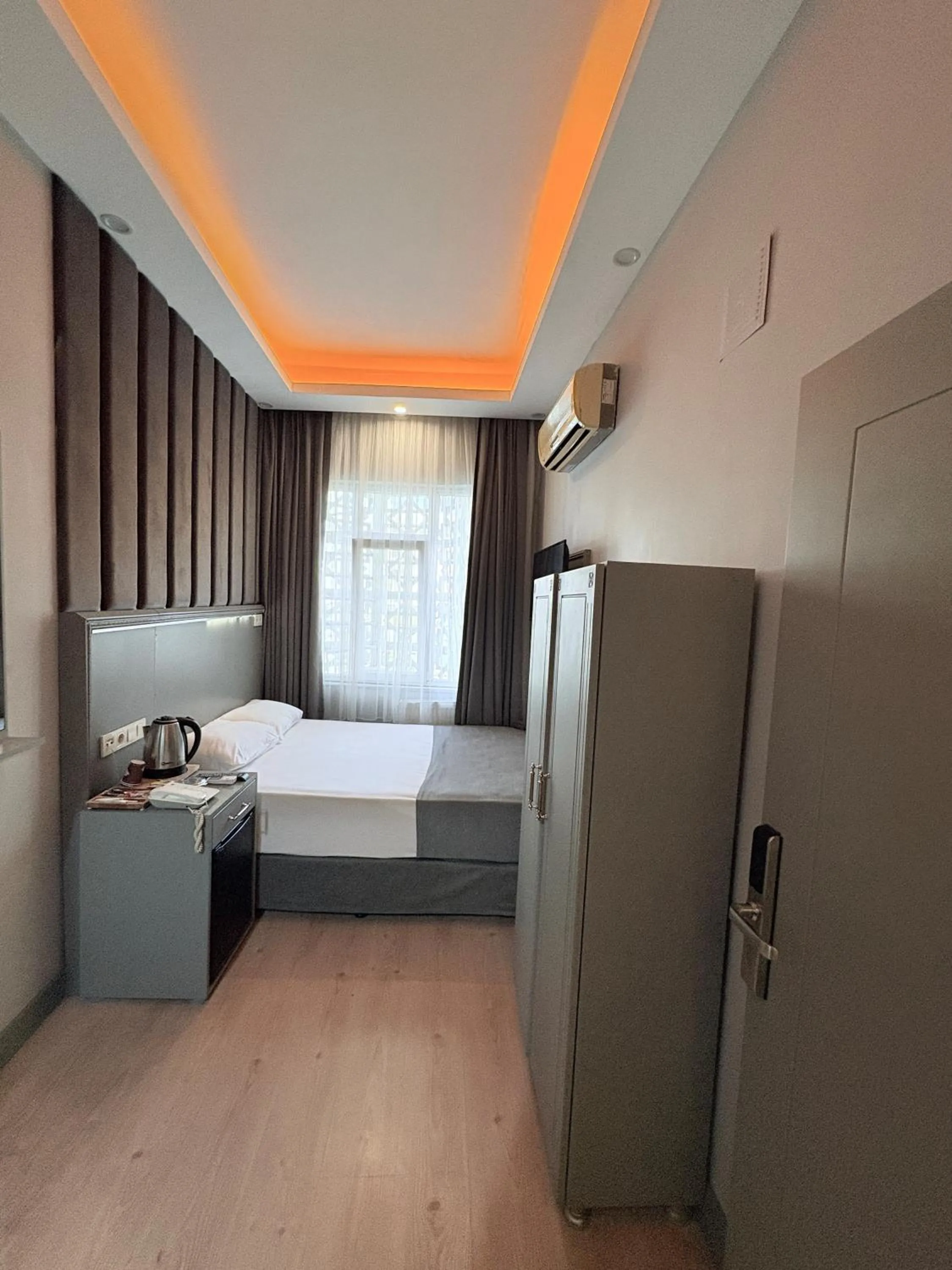 Bed in Crowned Plus Hotel